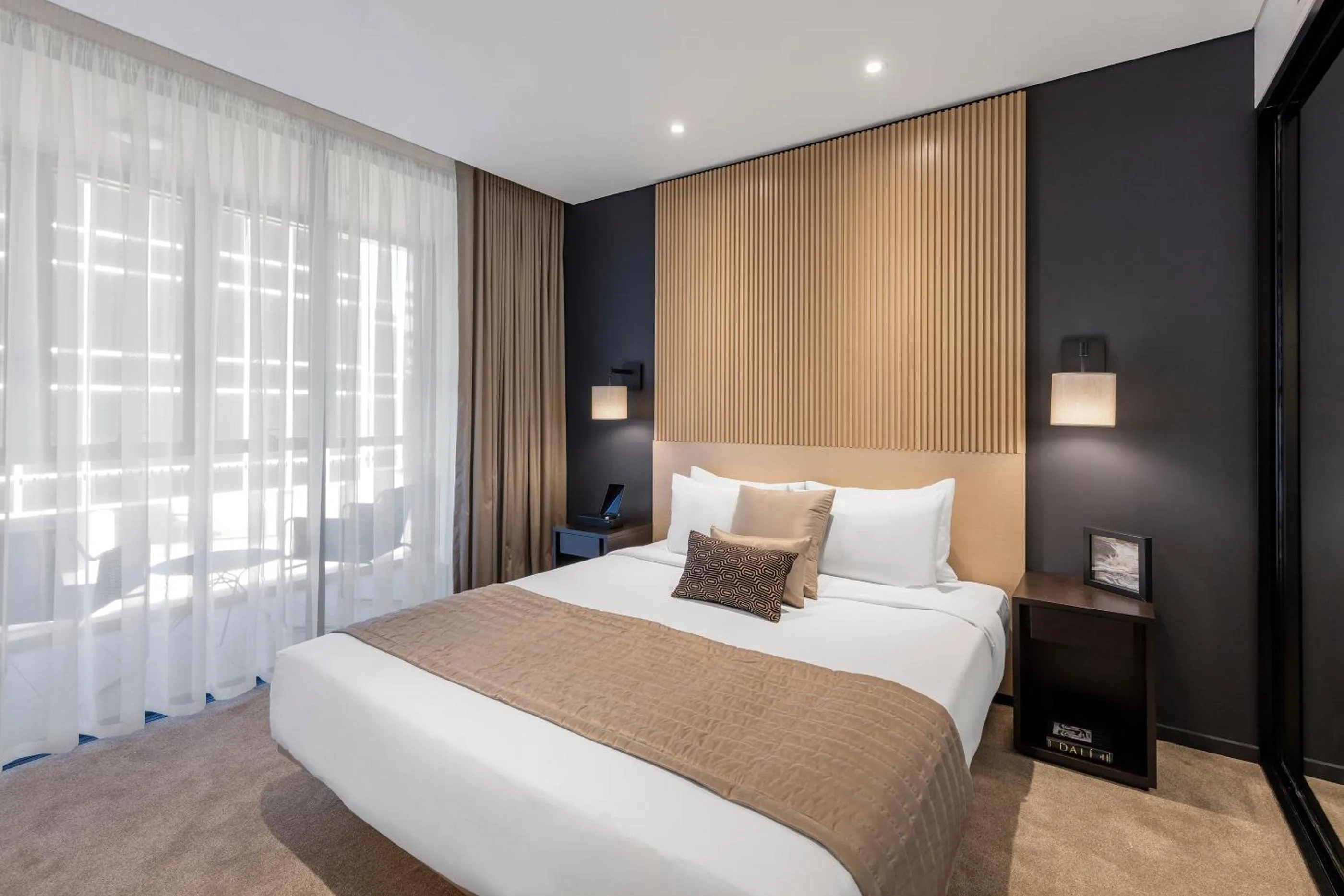 Bed in SKYE Hotel Suites Parramatta