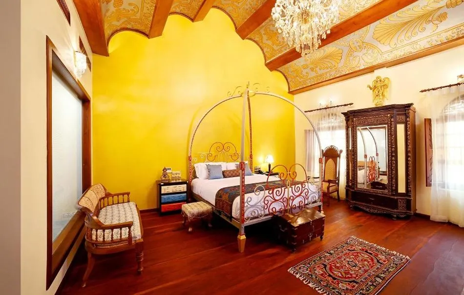 Bed in Ginger House Museum Hotel