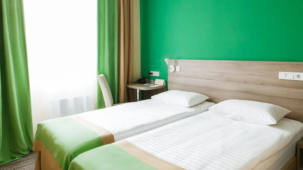 Bed in Raziotel Kyiv Yamska