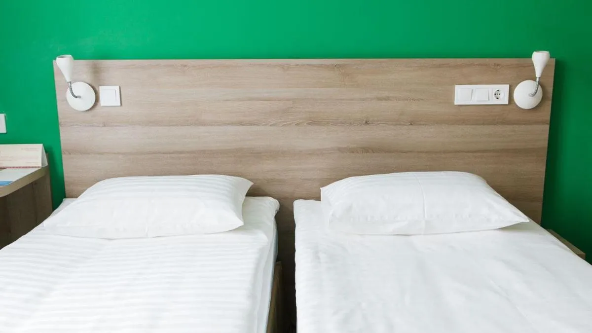 Bed in Raziotel Kyiv Yamska