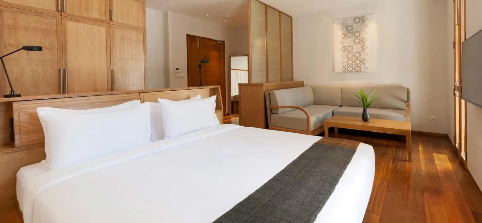 Bed in Avani+ Luang Prabang Hotel