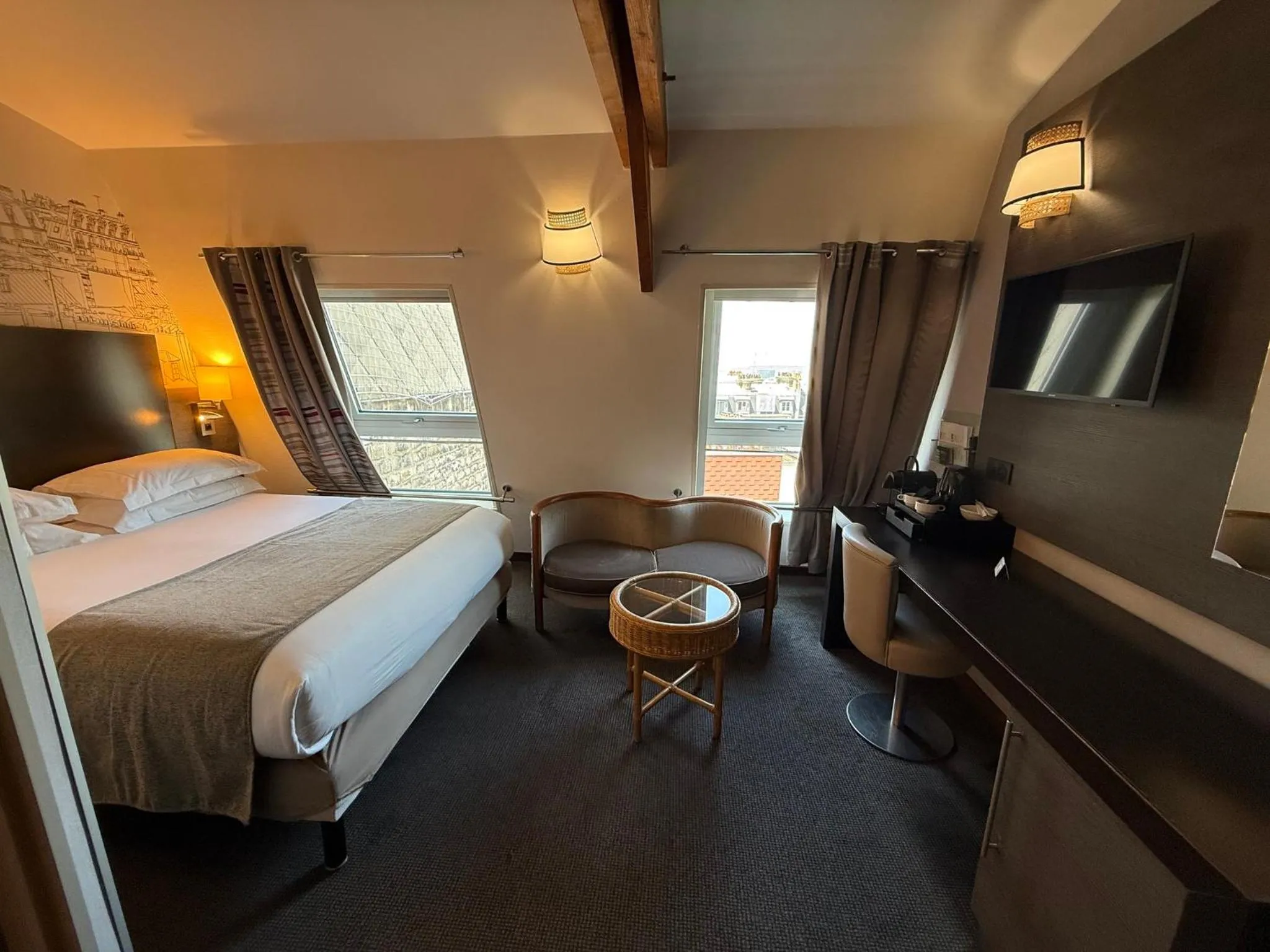 Photo of the whole room, Bed in Holiday Inn Paris Montmartre by IHG