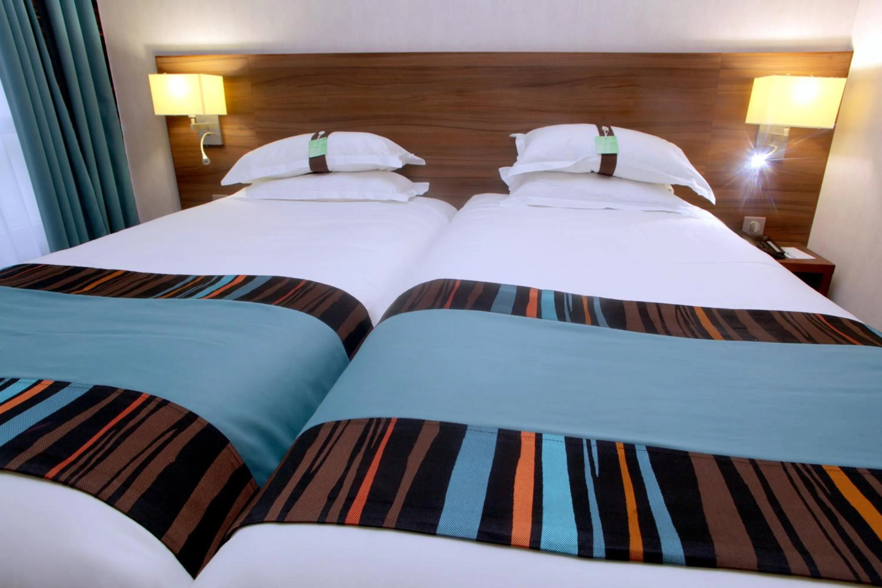 Photo of the whole room, Bed in Holiday Inn Paris Montmartre by IHG