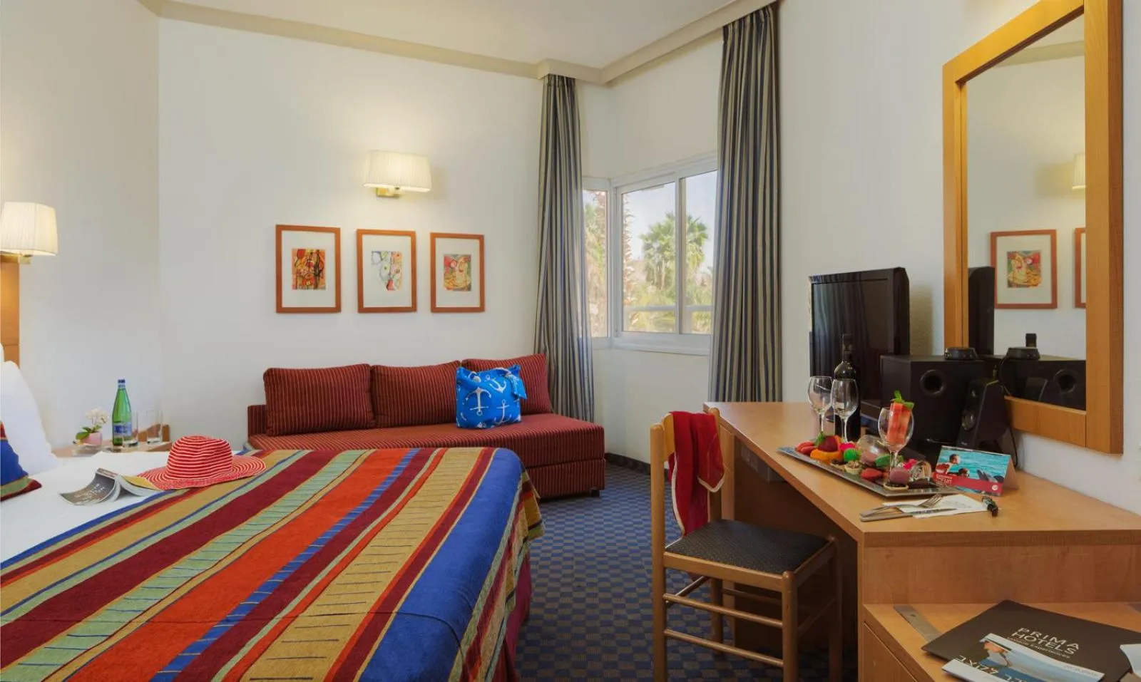 Seating area, Bed in Prima Music Hotel