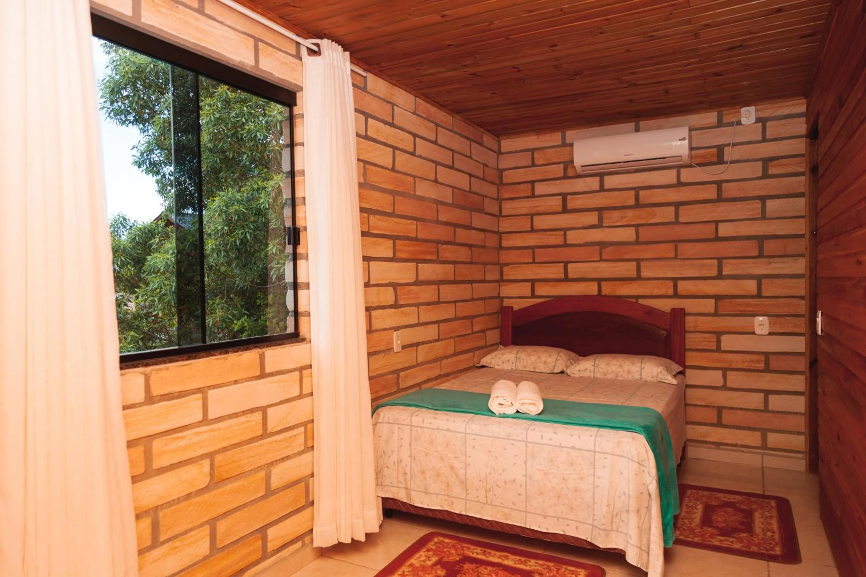 Bed in Pousada Água dos Canyons