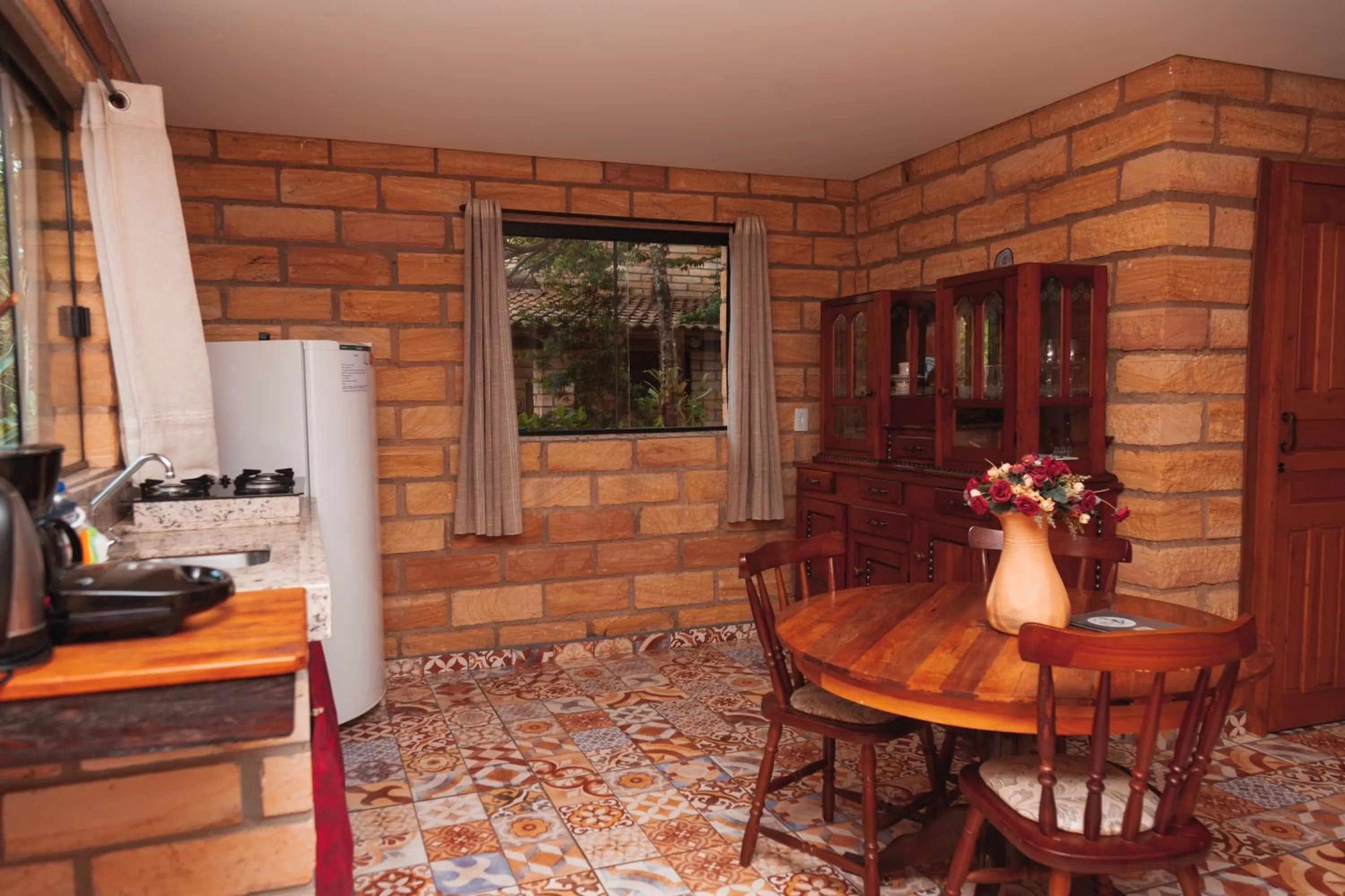 Kitchen or kitchenette in Pousada Água dos Canyons