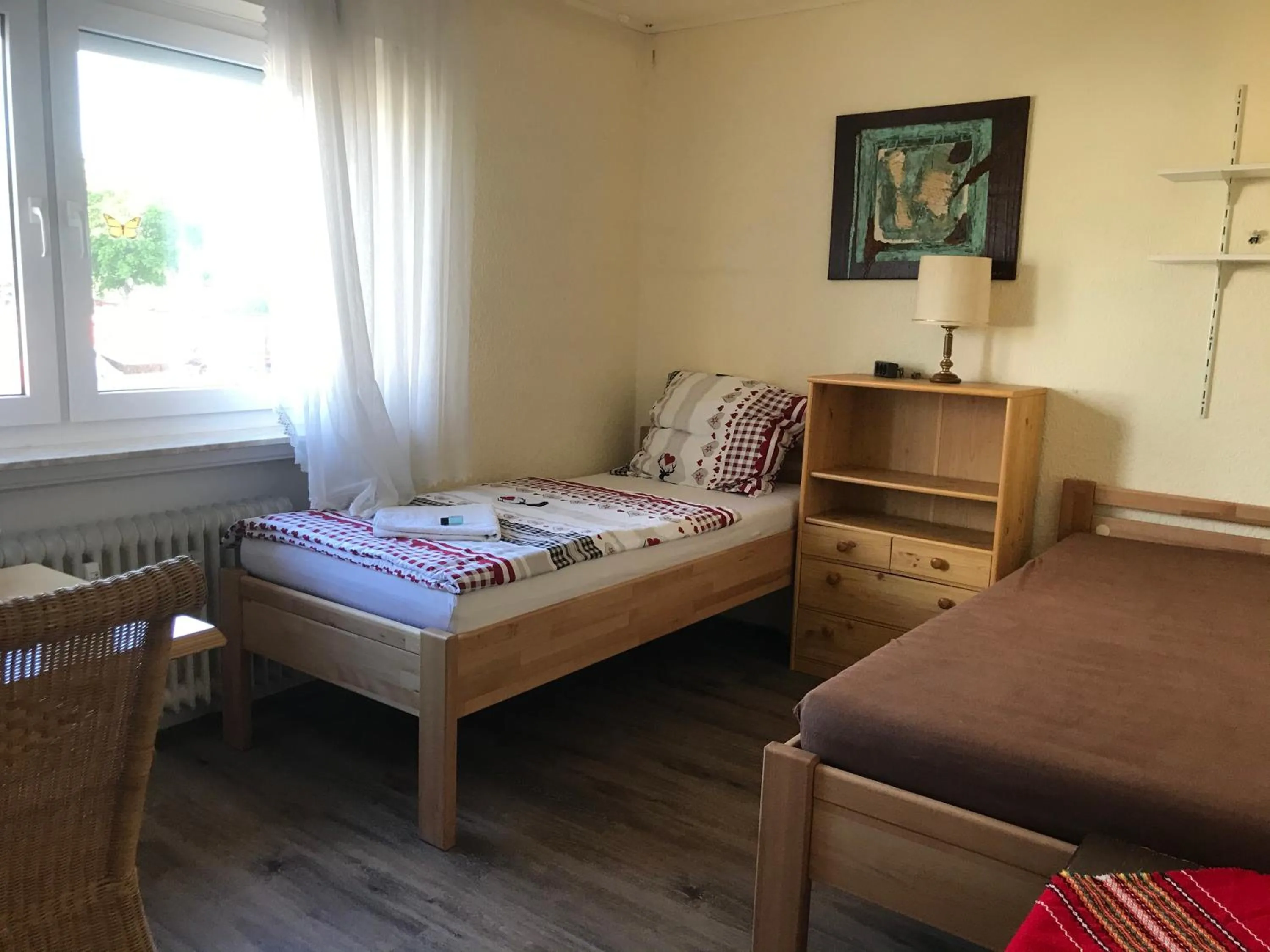 Photo of the whole room, Bed in Die Werkstatt