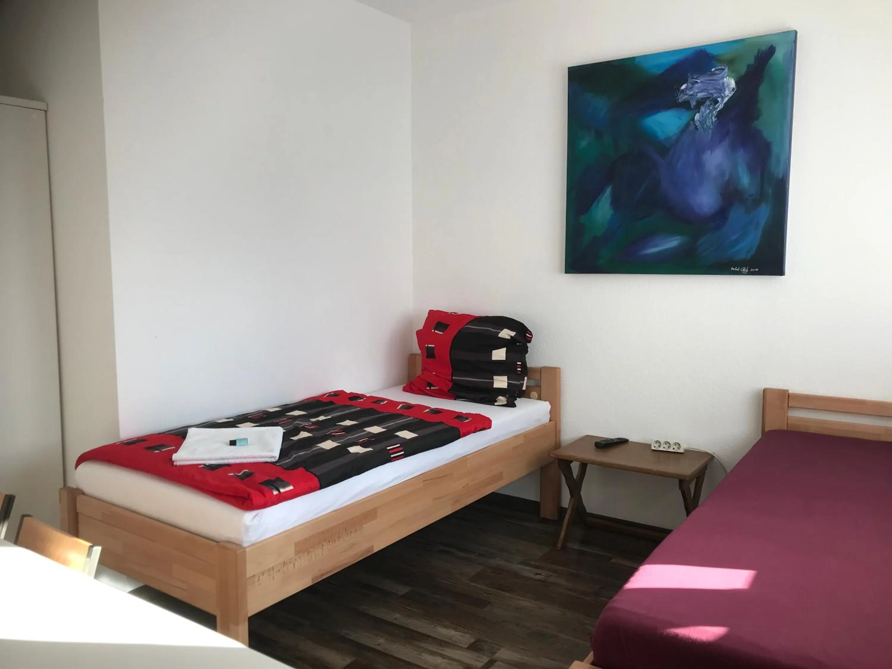 Photo of the whole room, Bed in Die Werkstatt