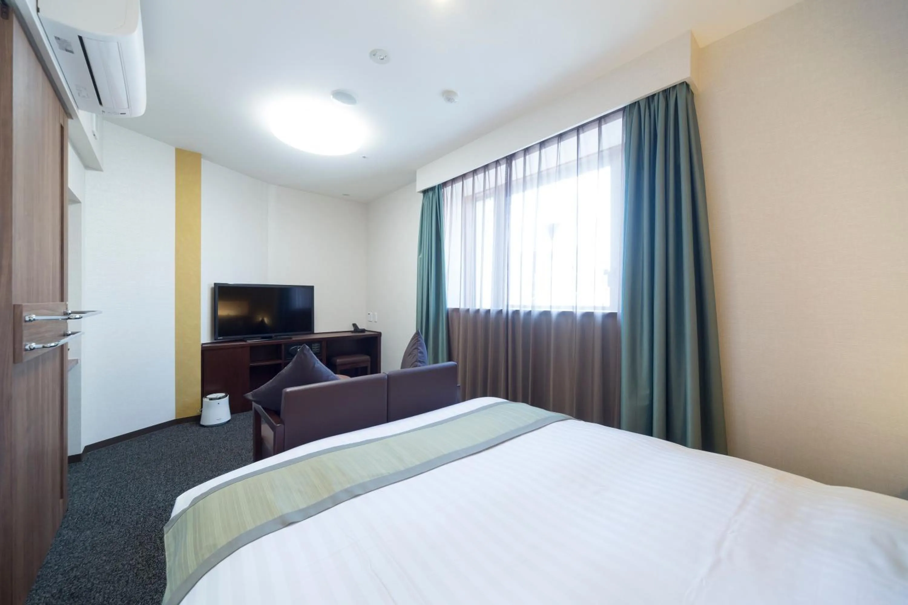 Photo of the whole room, Bed in Dormy Inn Premium Kanda