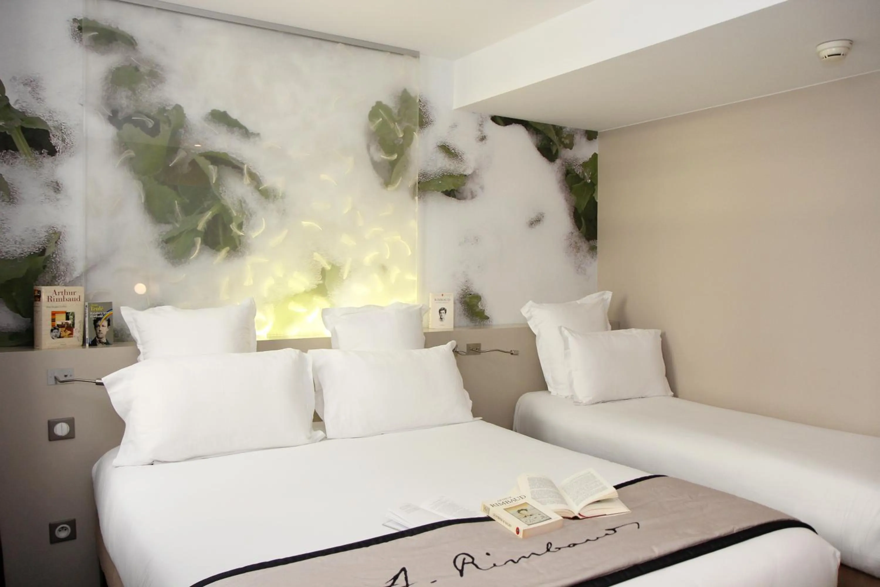 Bed in Hôtel Littéraire Arthur Rimbaud, BW Signature Collection