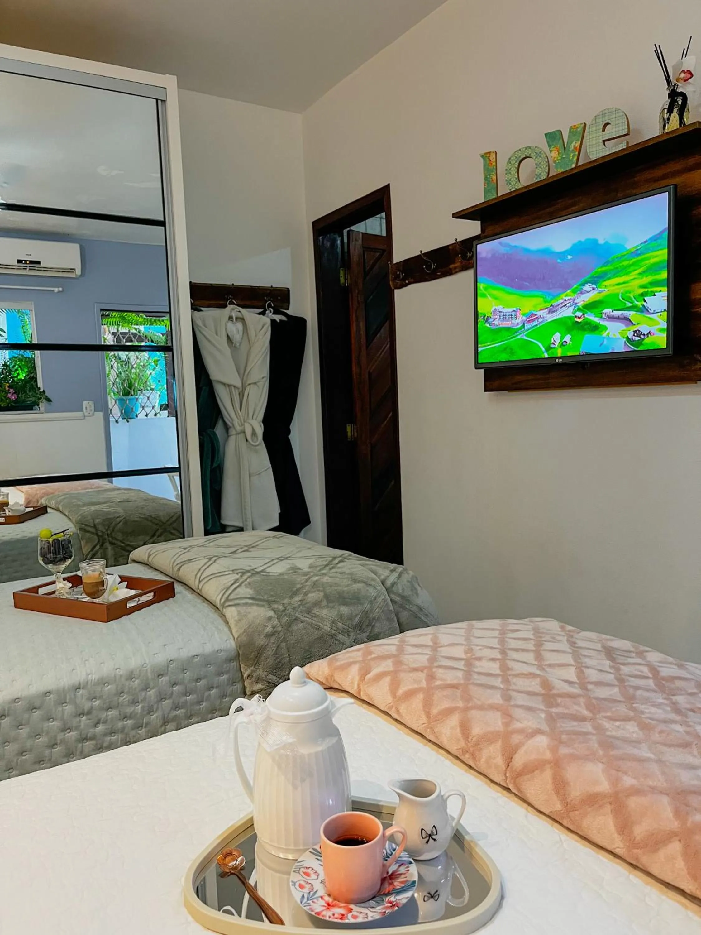 Bed in Pousada Recanto da Família