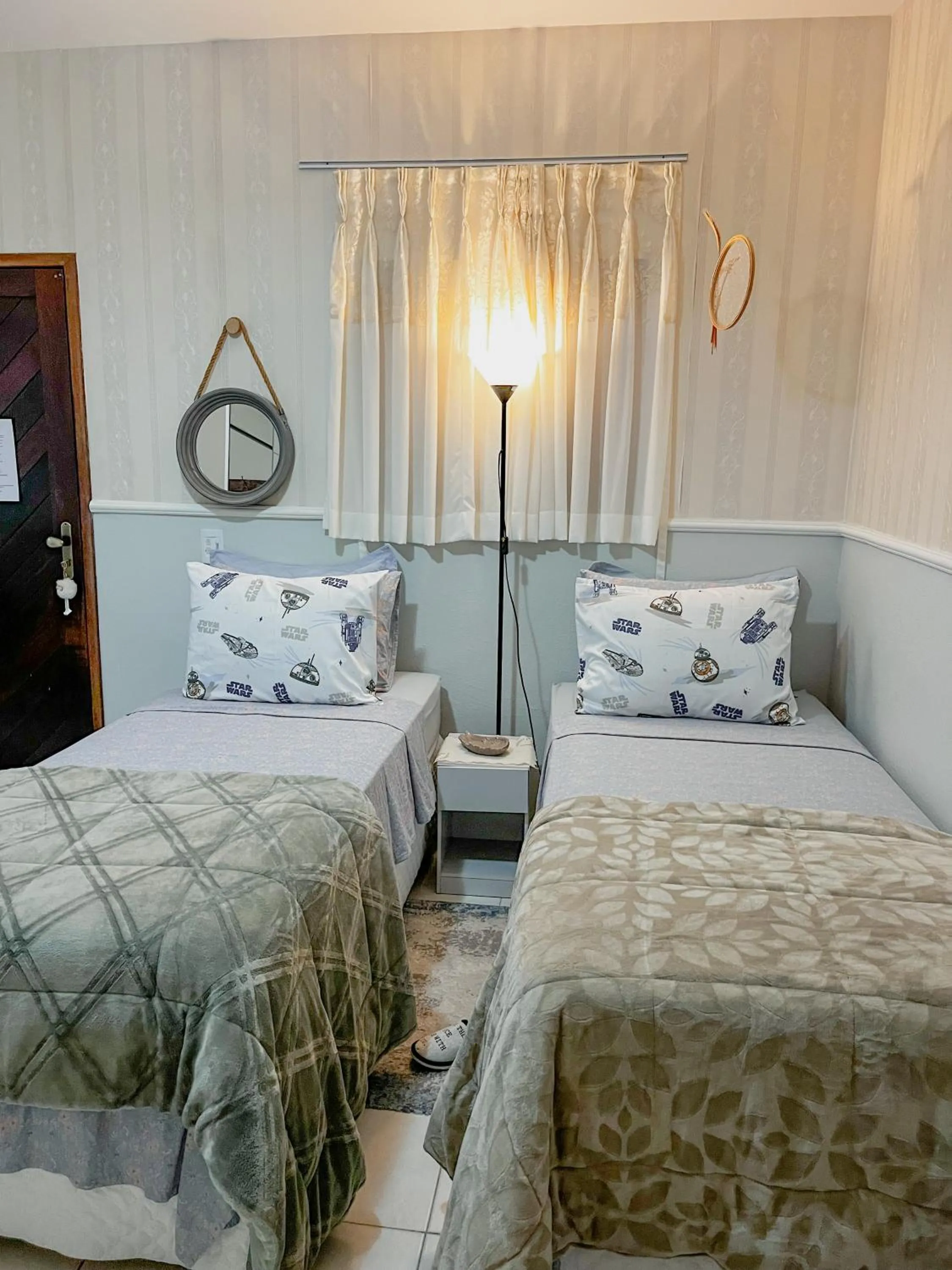 Bed in Pousada Recanto da Família