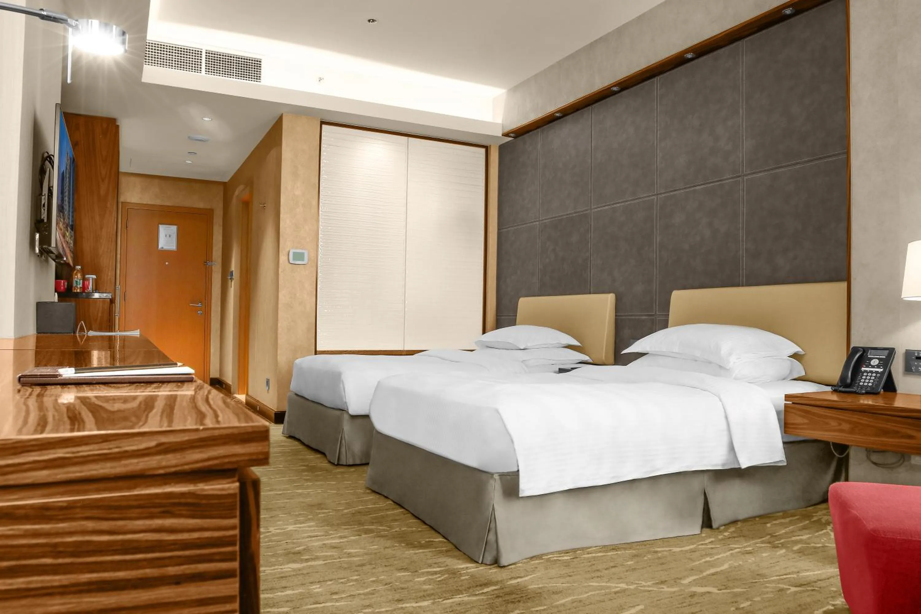 Bed in Millennium Plaza Doha