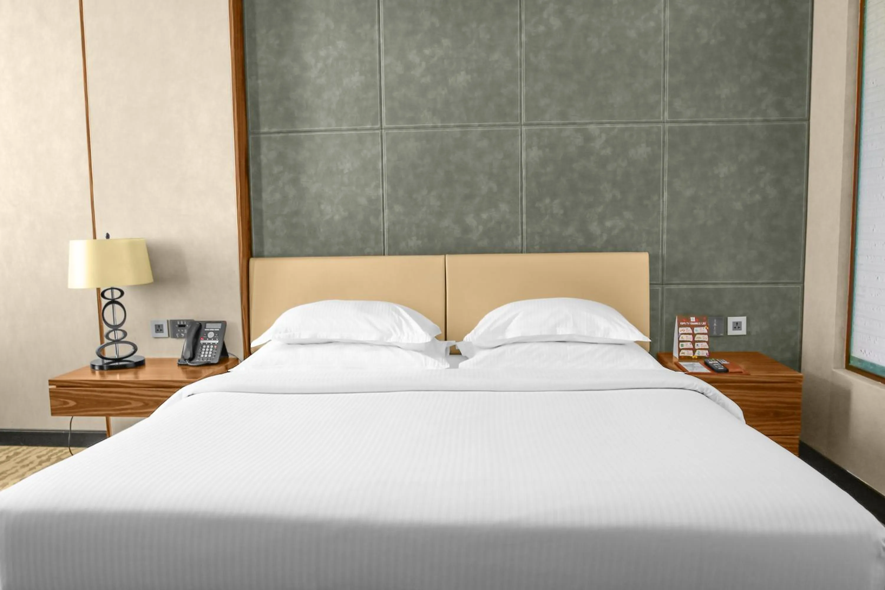 Bed in Millennium Plaza Doha