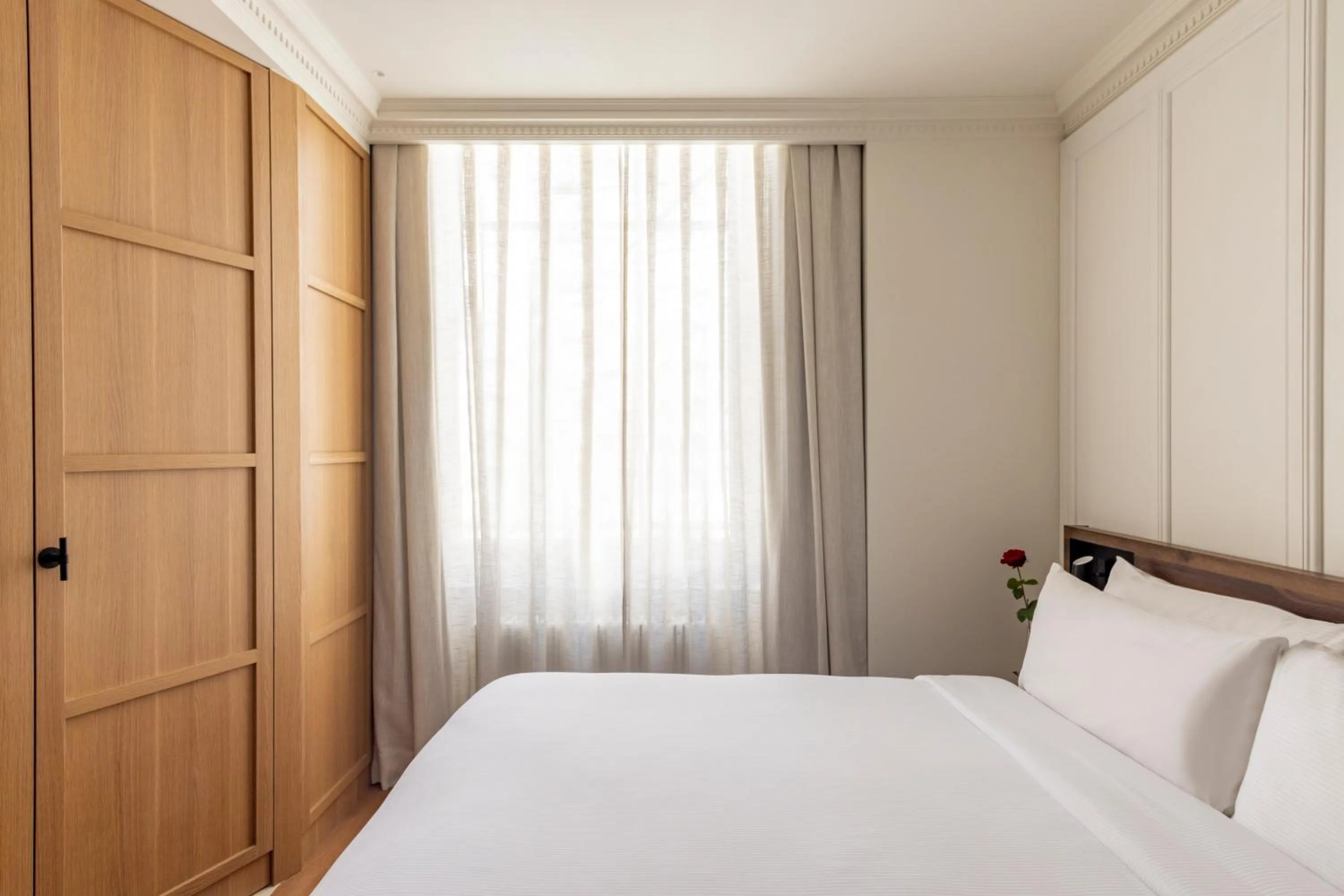 Bed in The Caesar Hotel