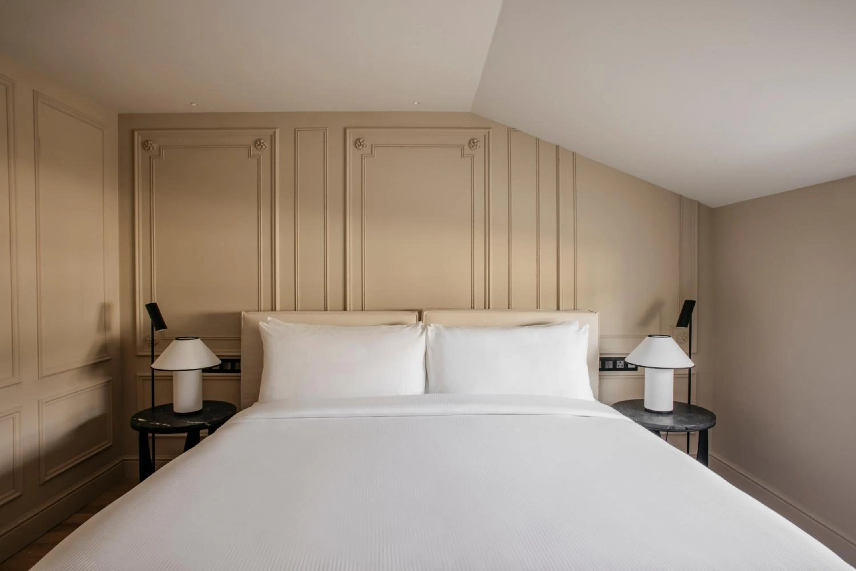 Bed in The Caesar Hotel