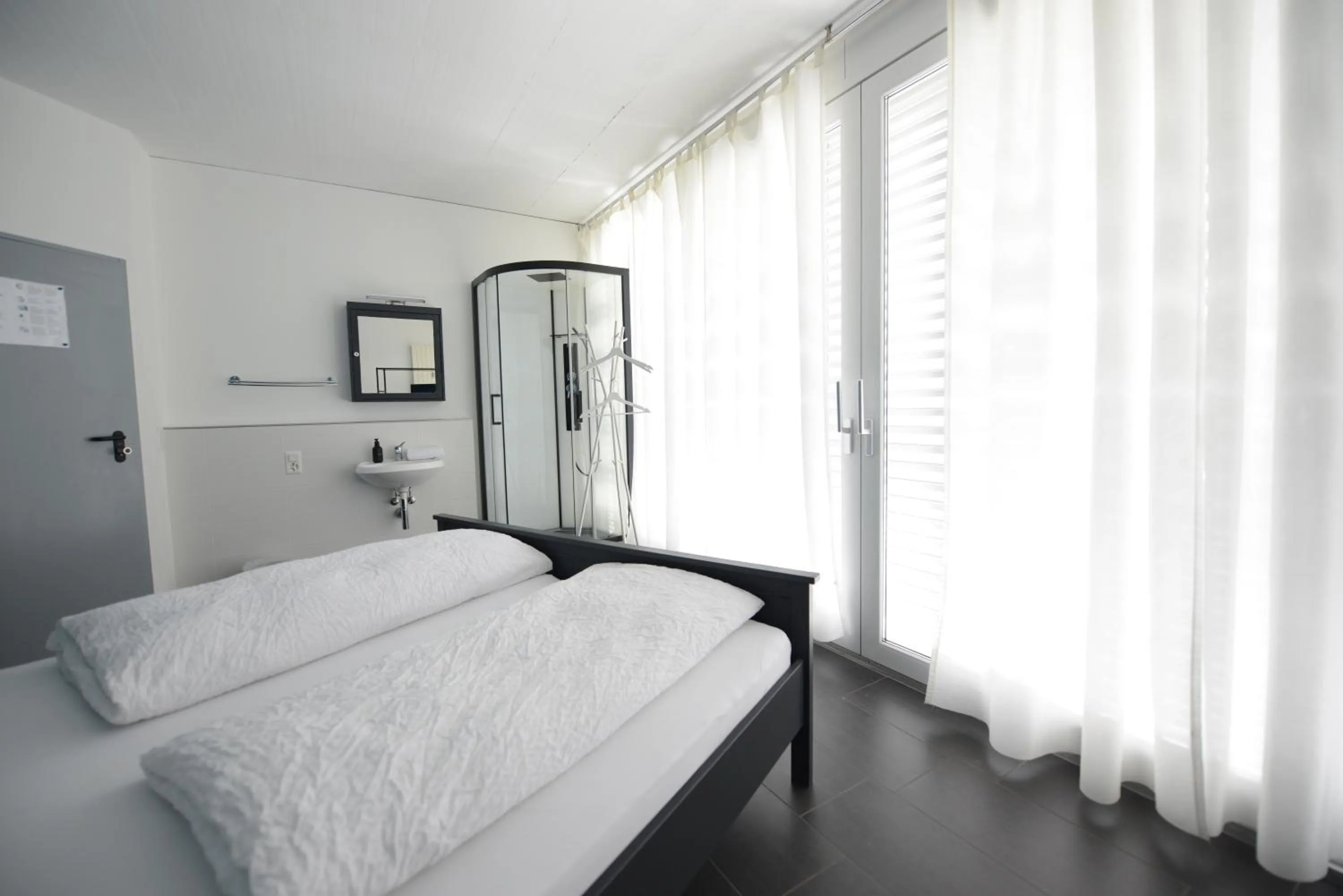 Photo of the whole room, Bed in Berger Zentrum