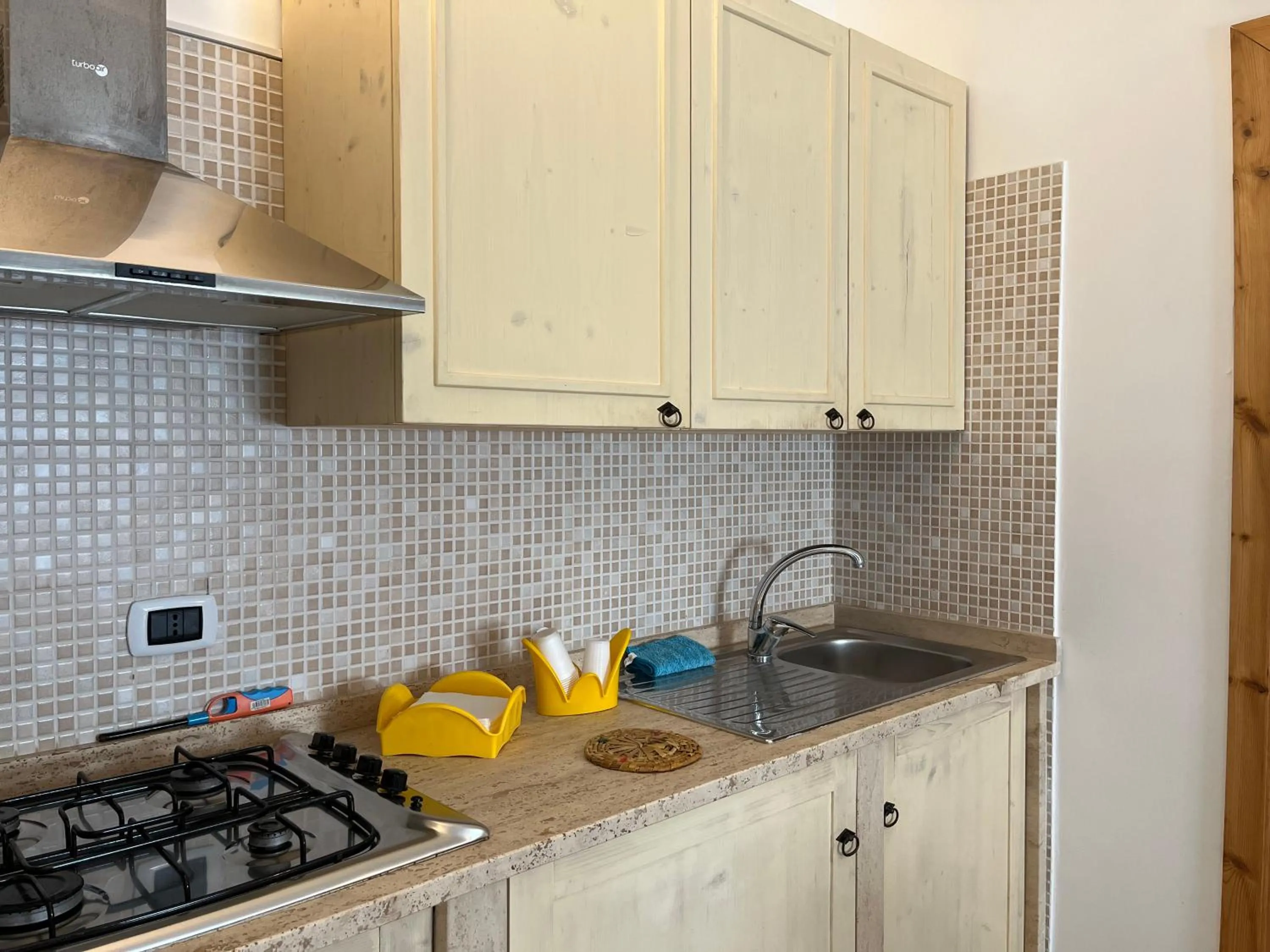 Kitchen or kitchenette in Casette Masseria La Camardia