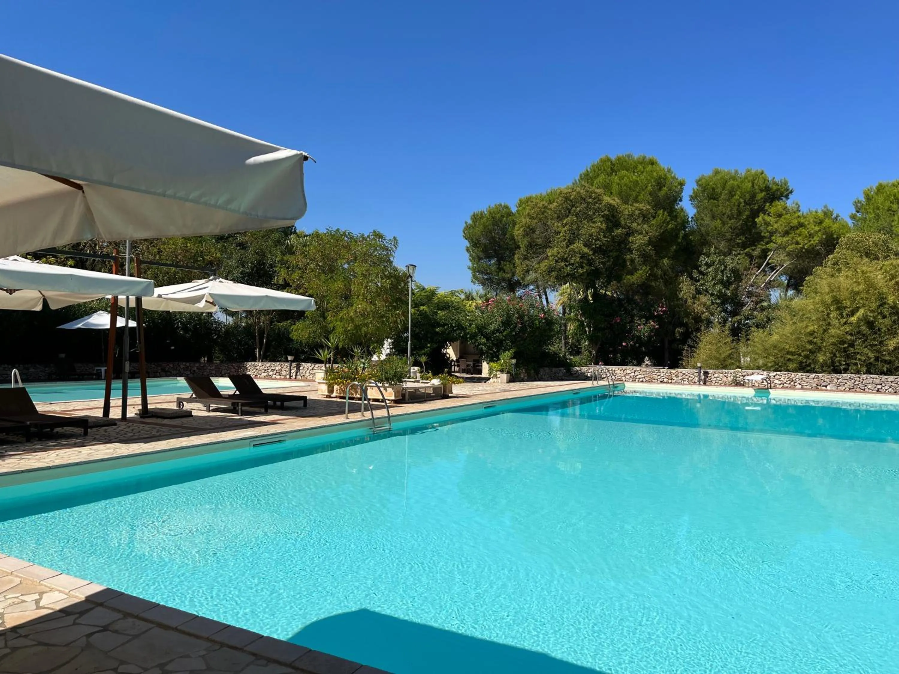 Swimming pool in Casette Masseria La Camardia