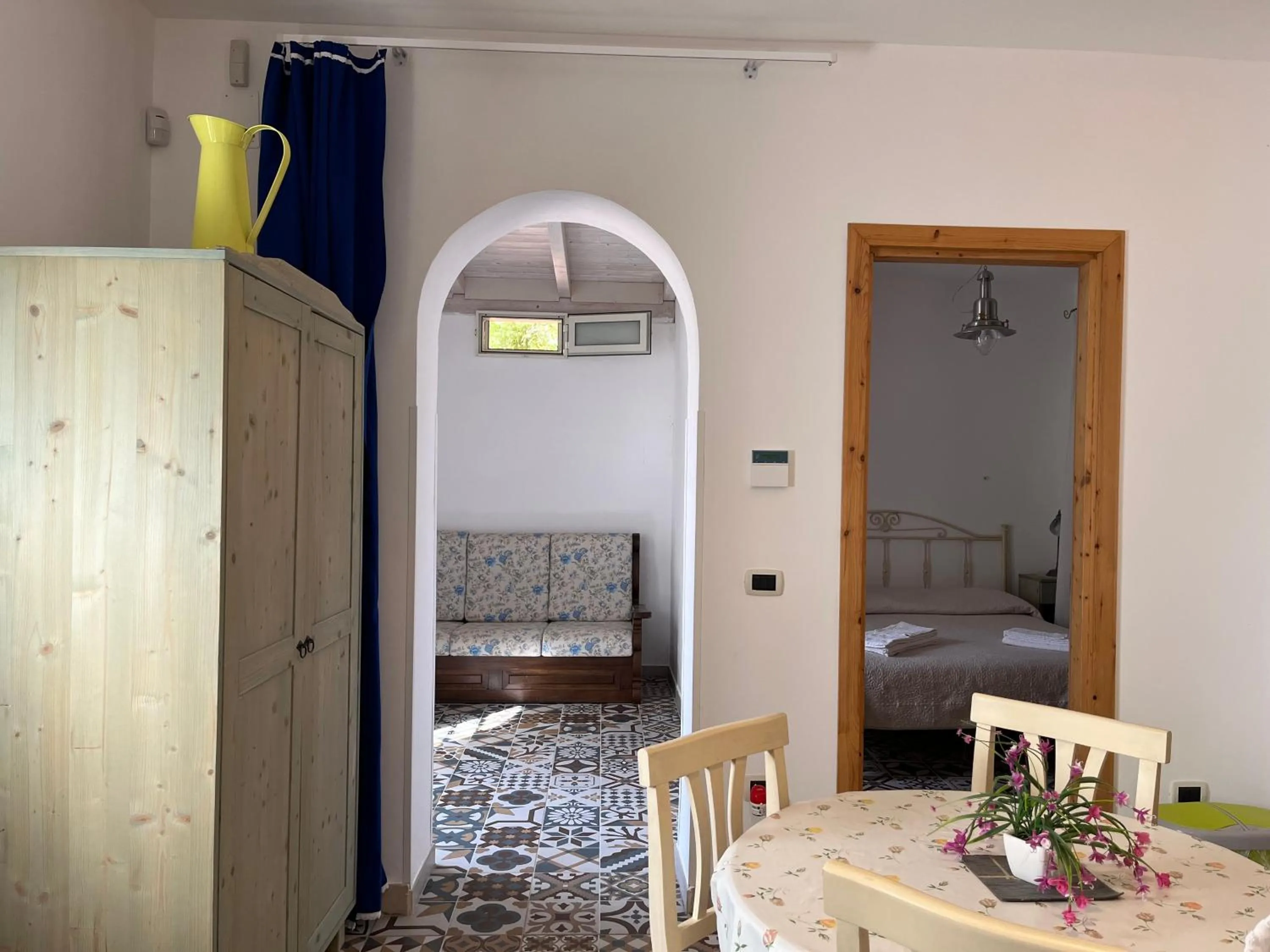 Living room, Bed in Casette Masseria La Camardia