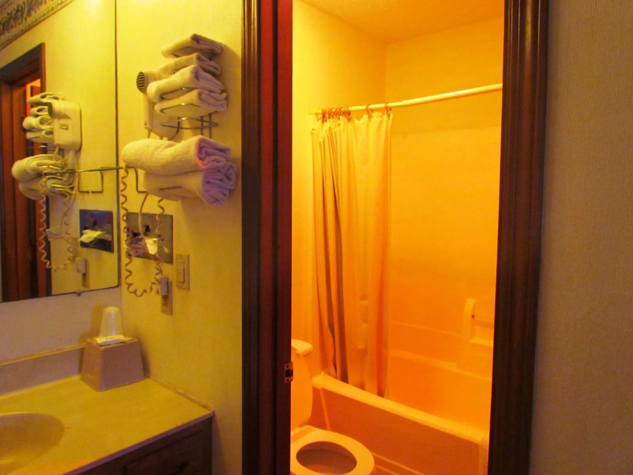 Bathroom in Travel Inn & Suites