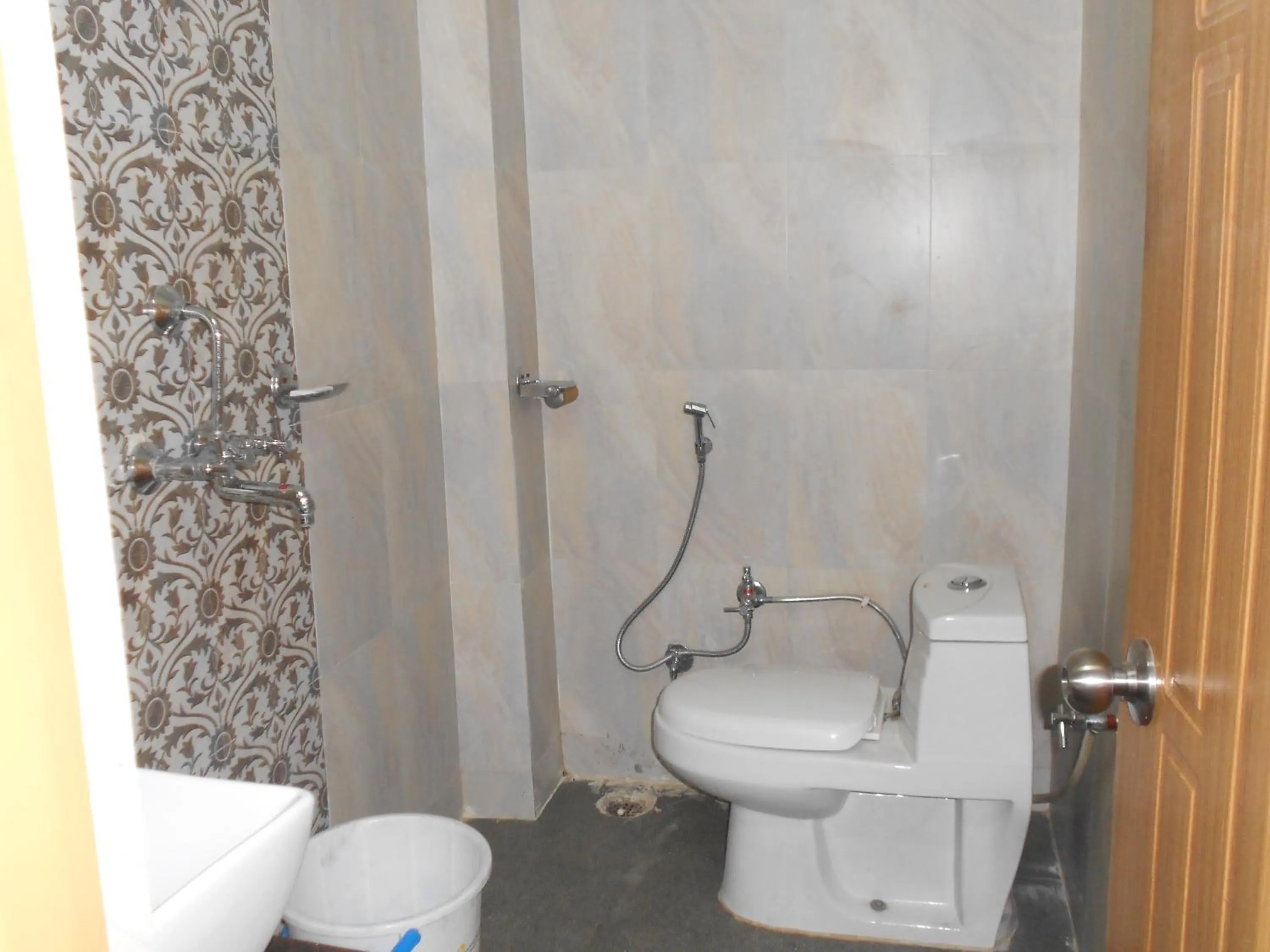 Bathroom in DS Residency Varanasi-Near Temple n Ghat-Parking