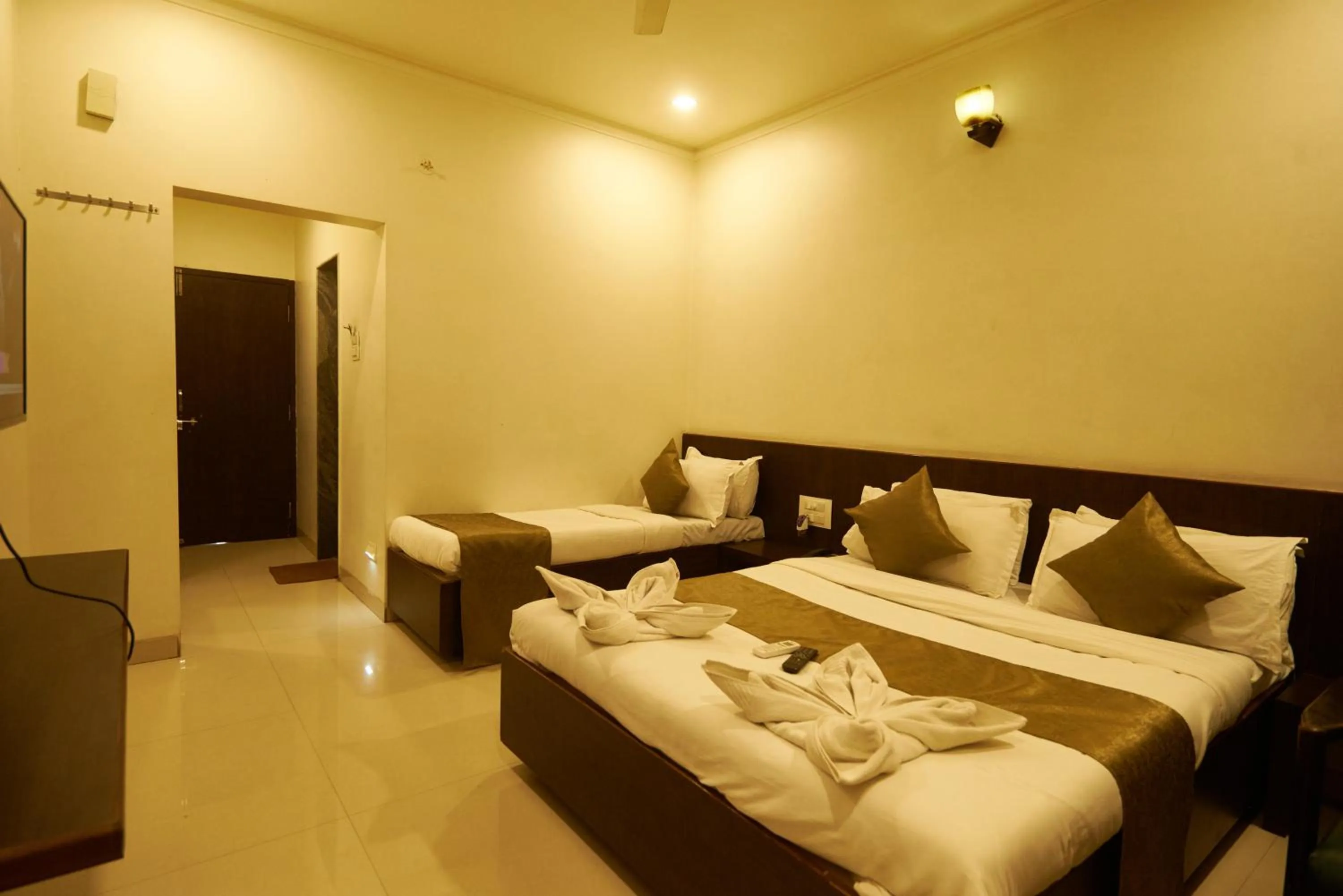Bed in Hotel Pride Inn Shirdi
