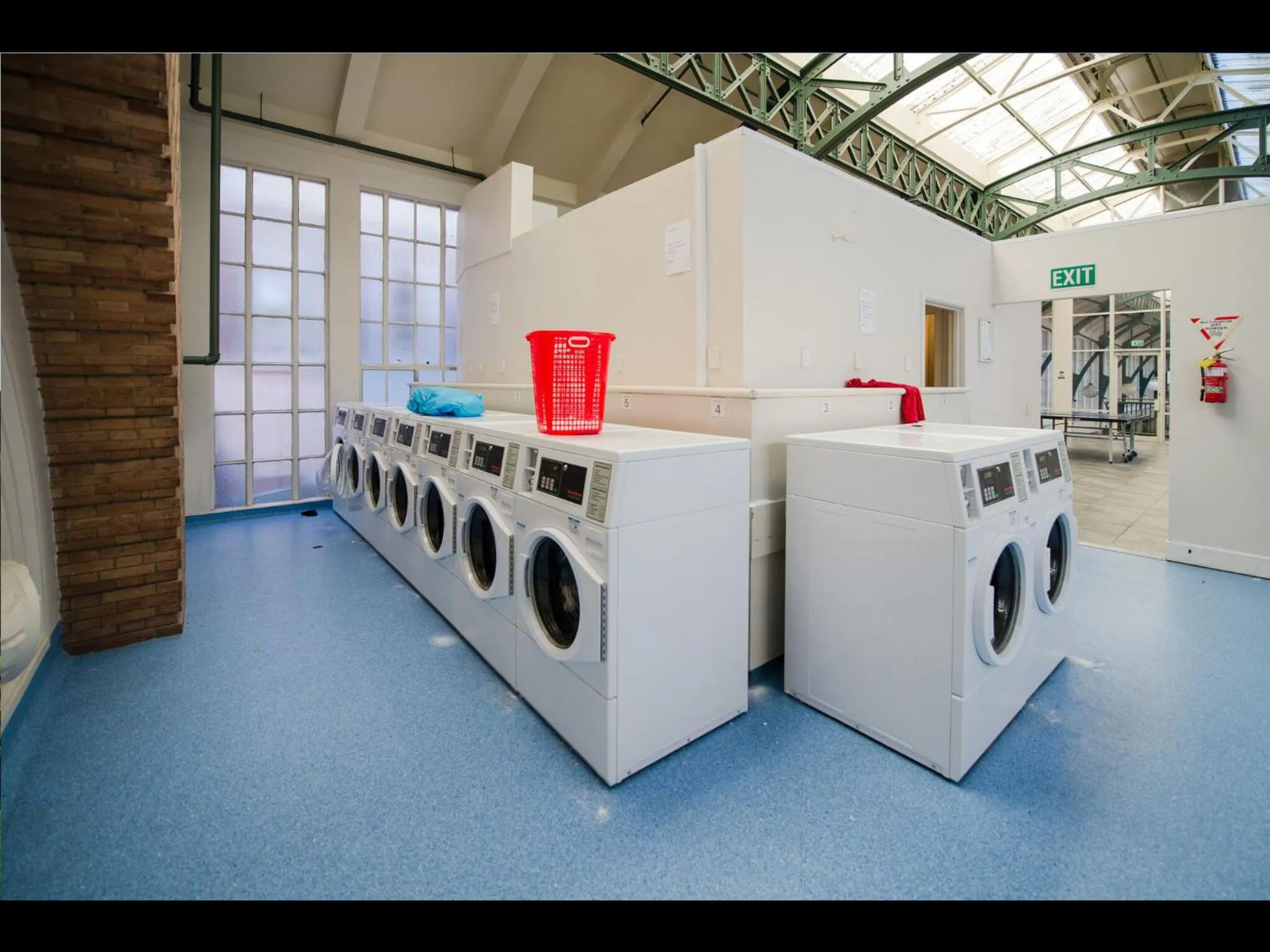 washing machine in Grand Central Serviced Apartments
