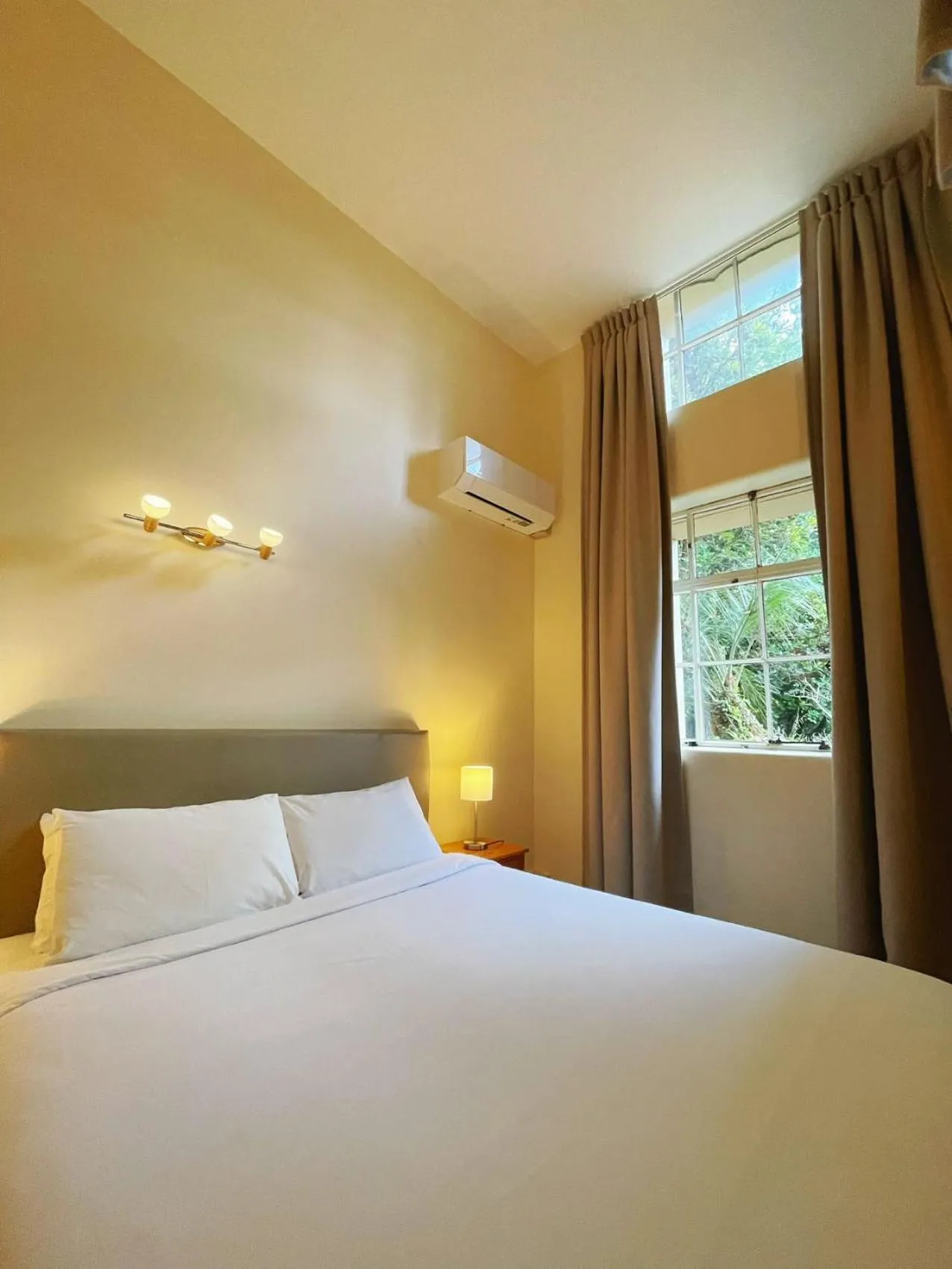 Bed in Grand Central Serviced Apartments