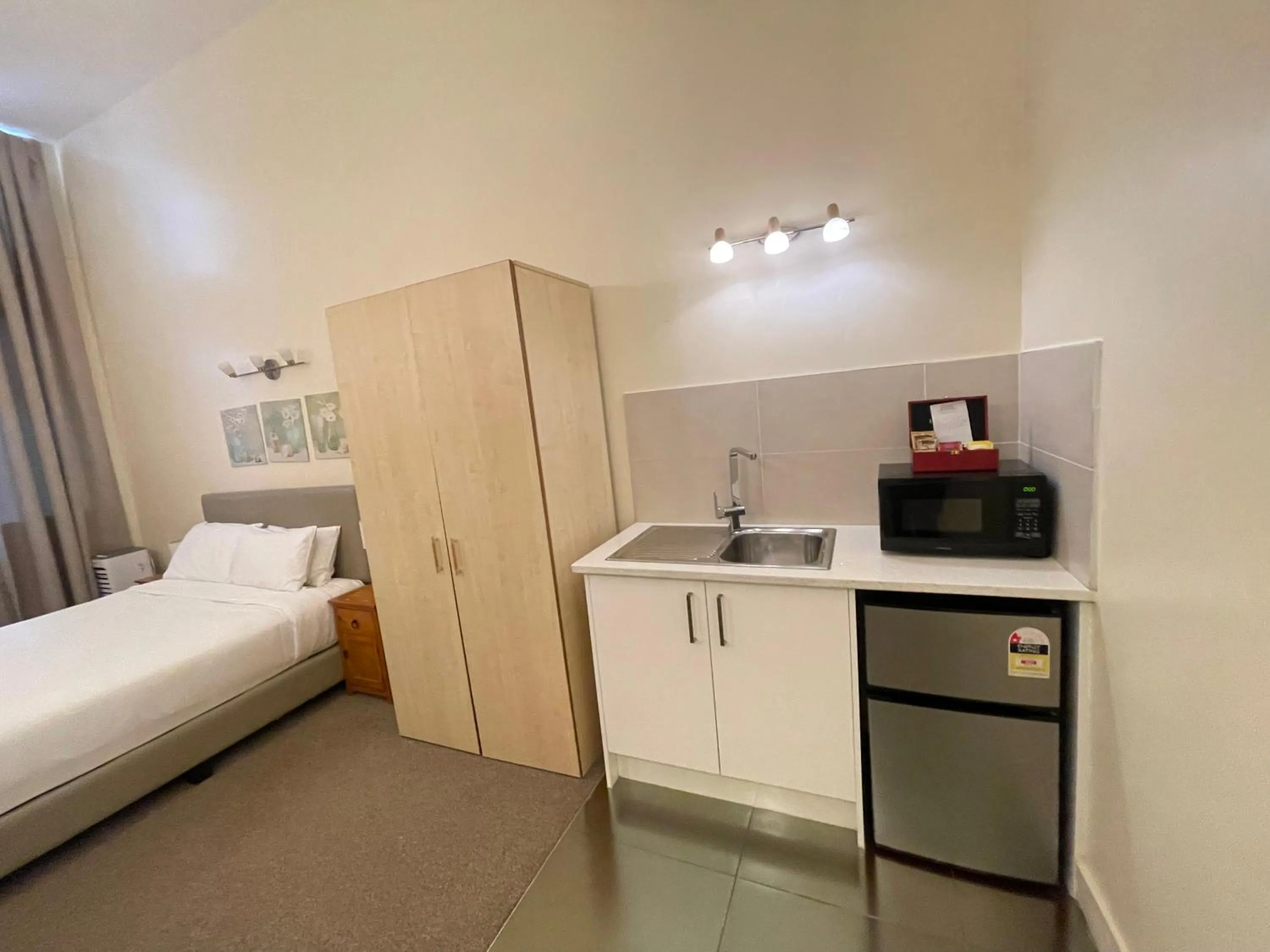 Bed in Grand Central Serviced Apartments
