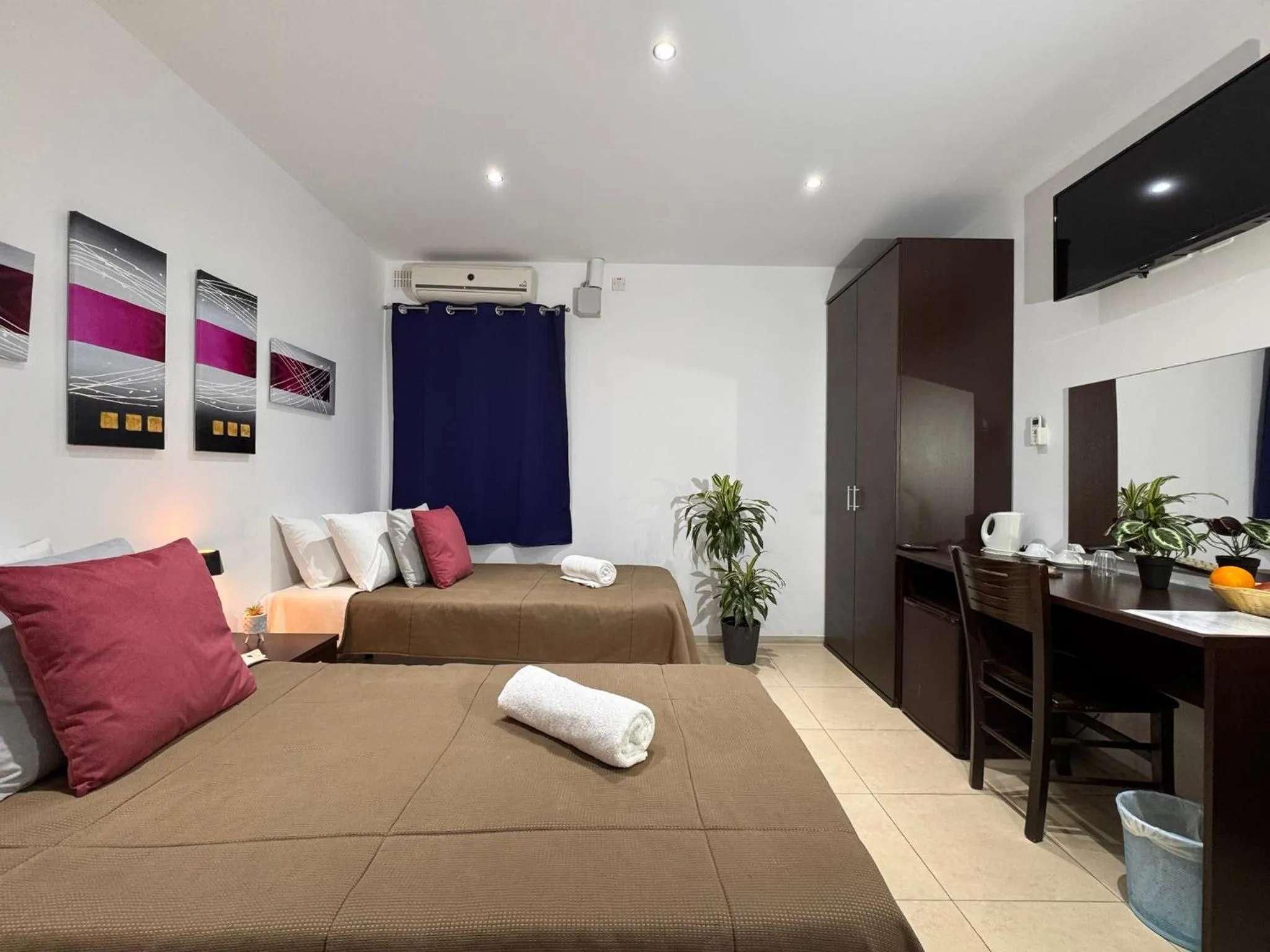 Bed in Allegro Hotel