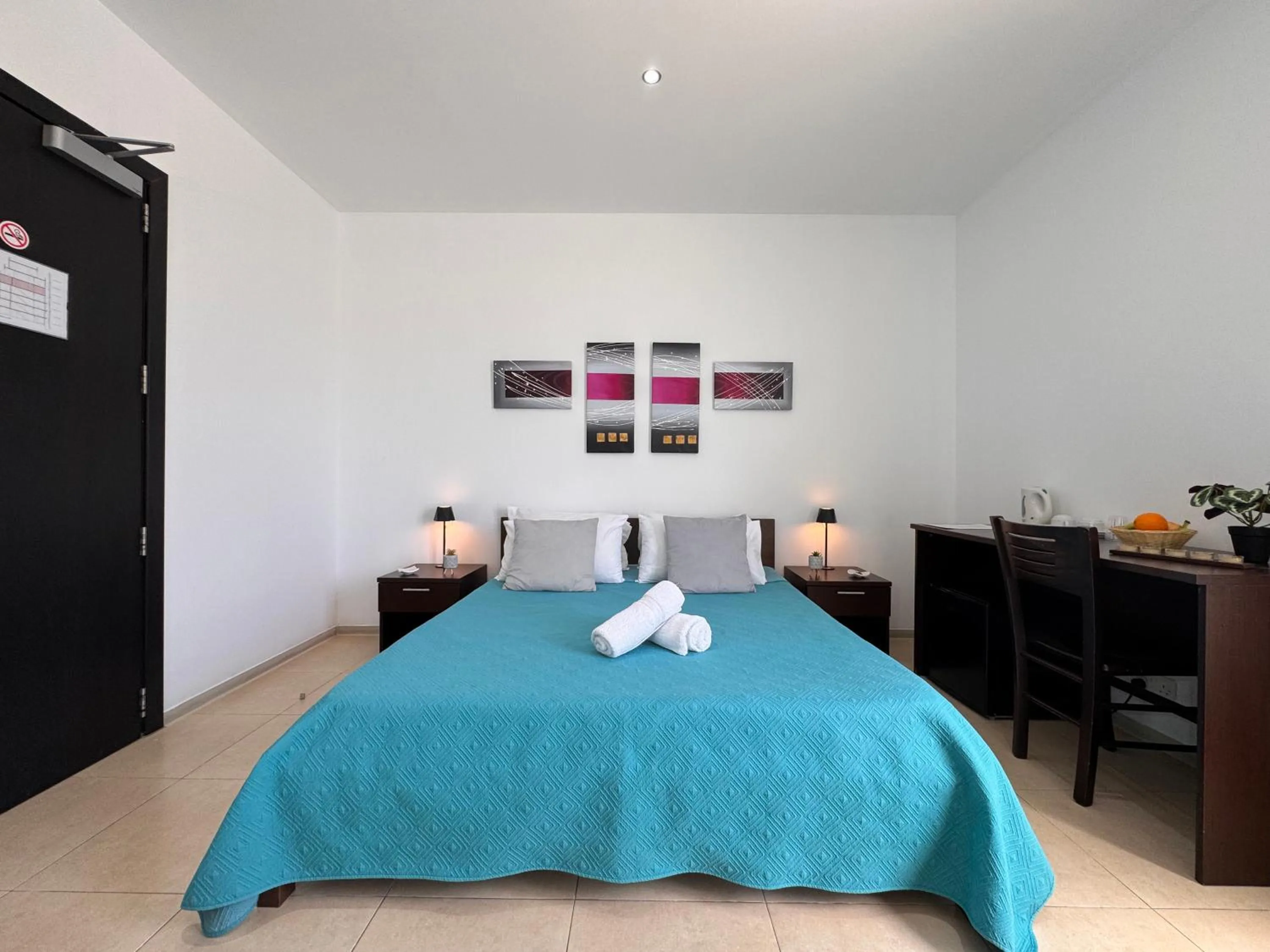 Bed in Allegro Hotel