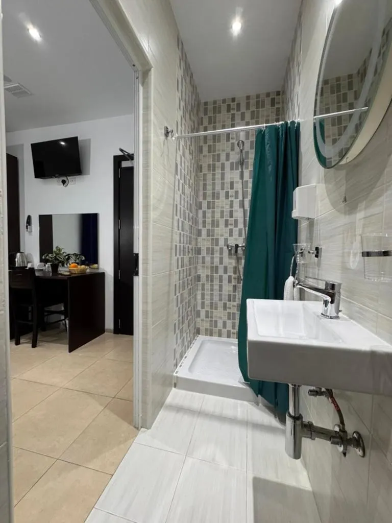 Bed in Allegro Hotel