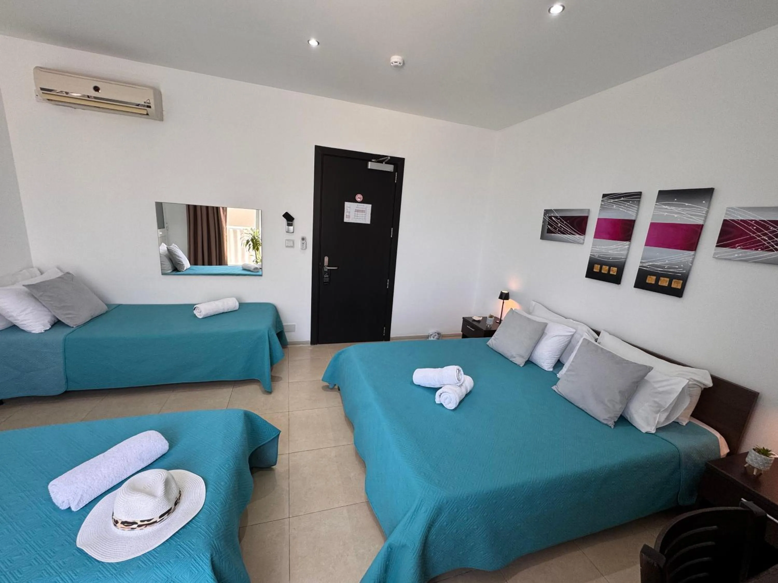 Bed in Allegro Hotel