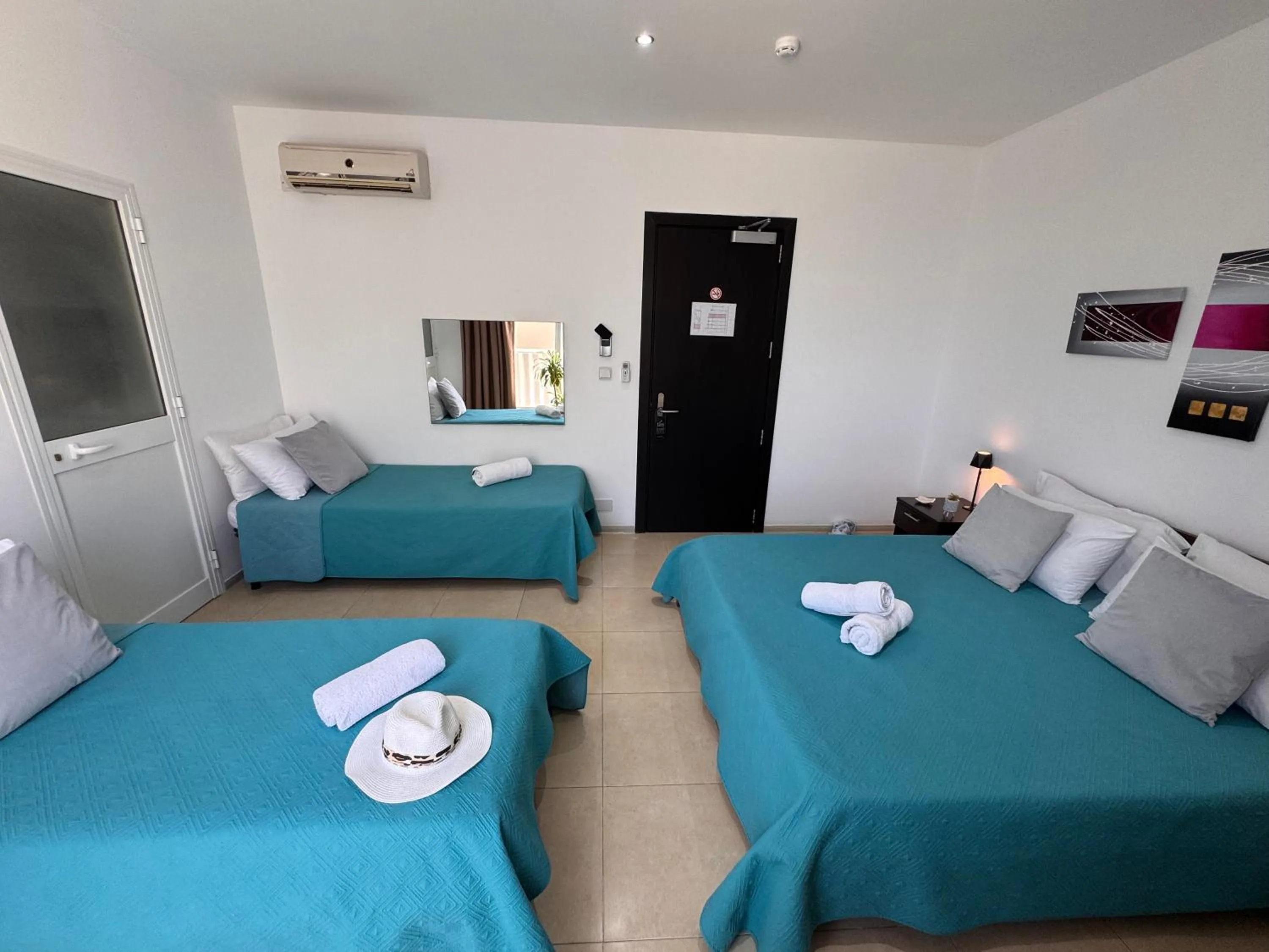 Bed in Allegro Hotel