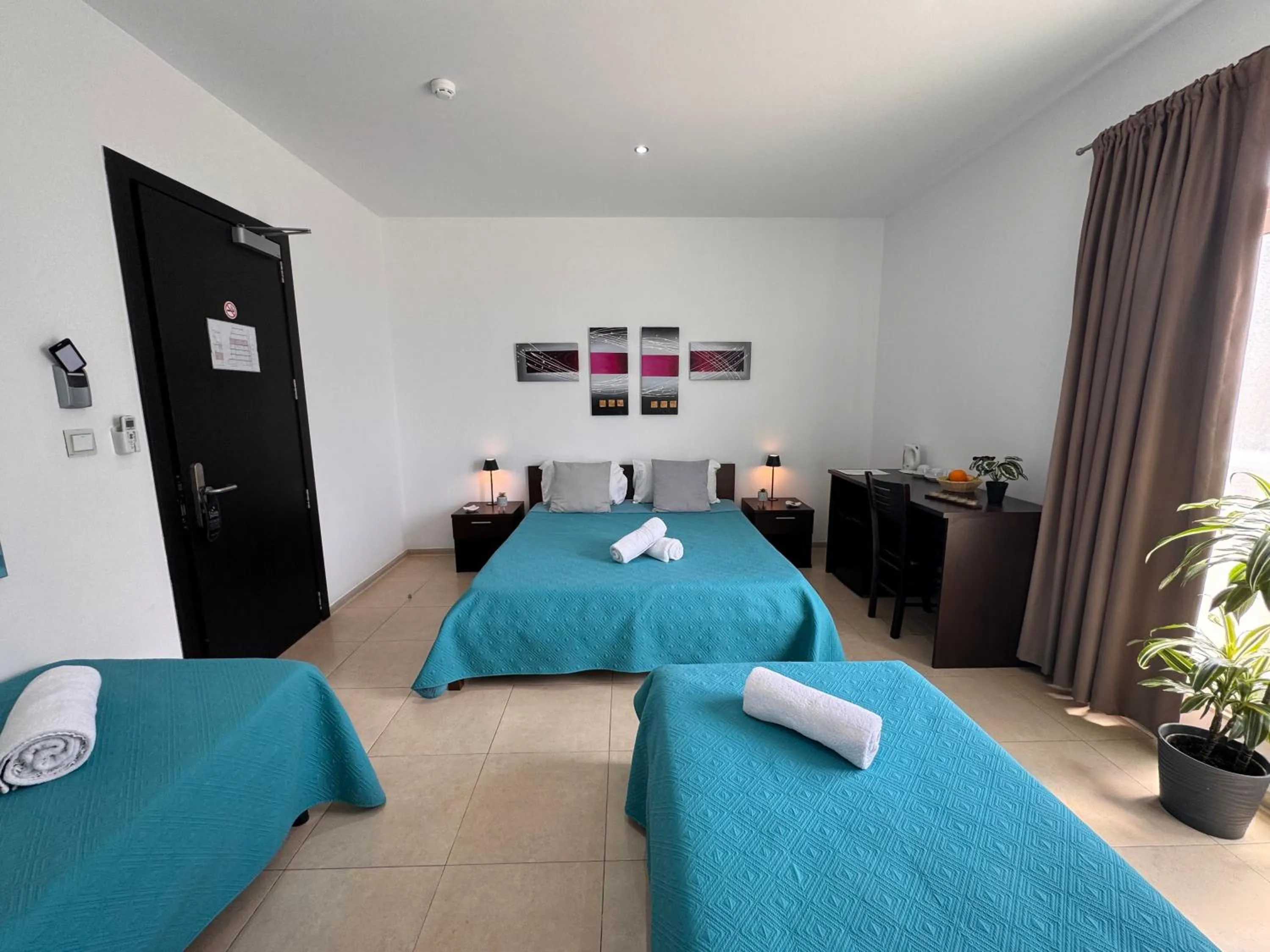 Bed in Allegro Hotel