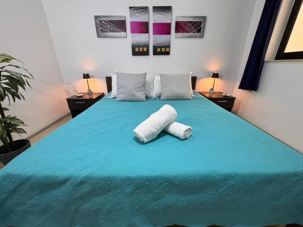 Bed in Allegro Hotel