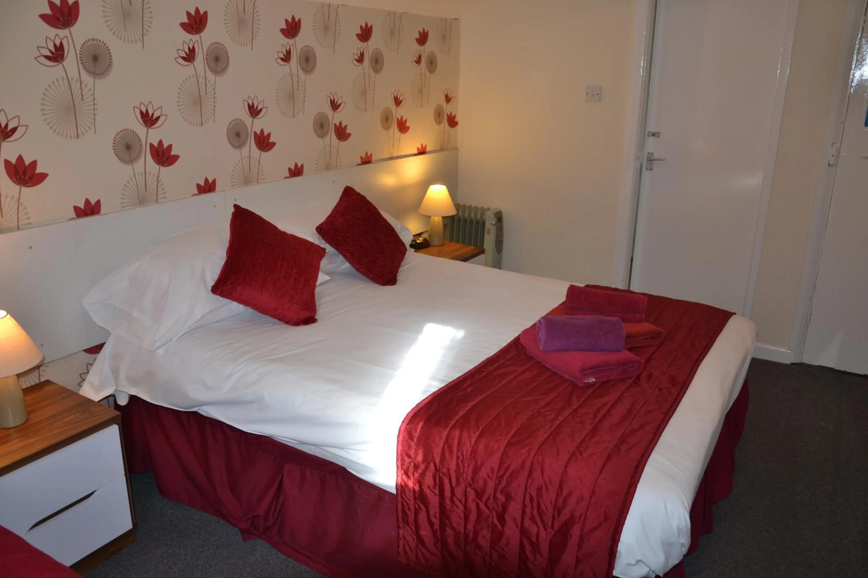 Bed in Abbey Lodge Hotel