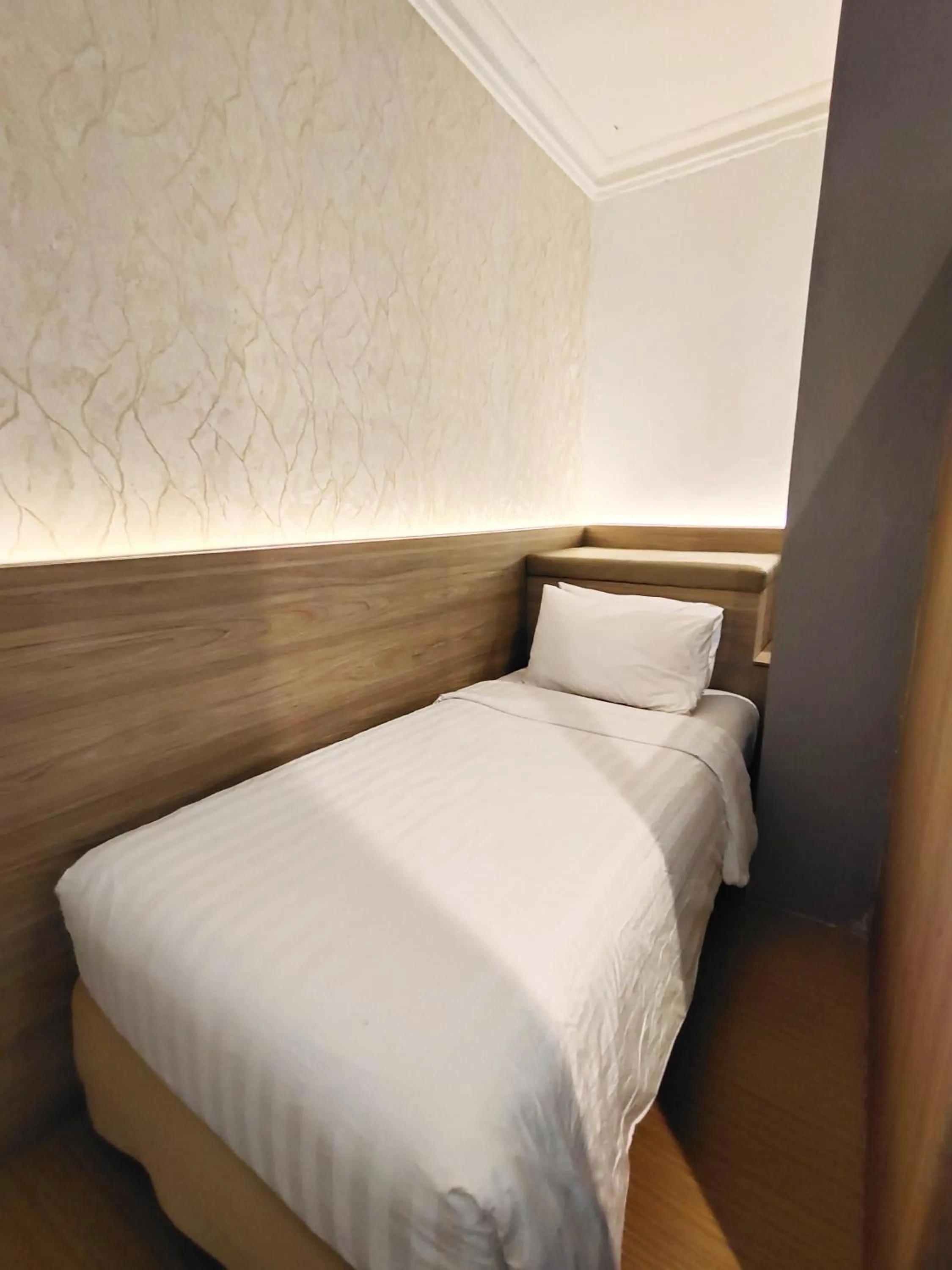 Bed in Royal Park Hotel