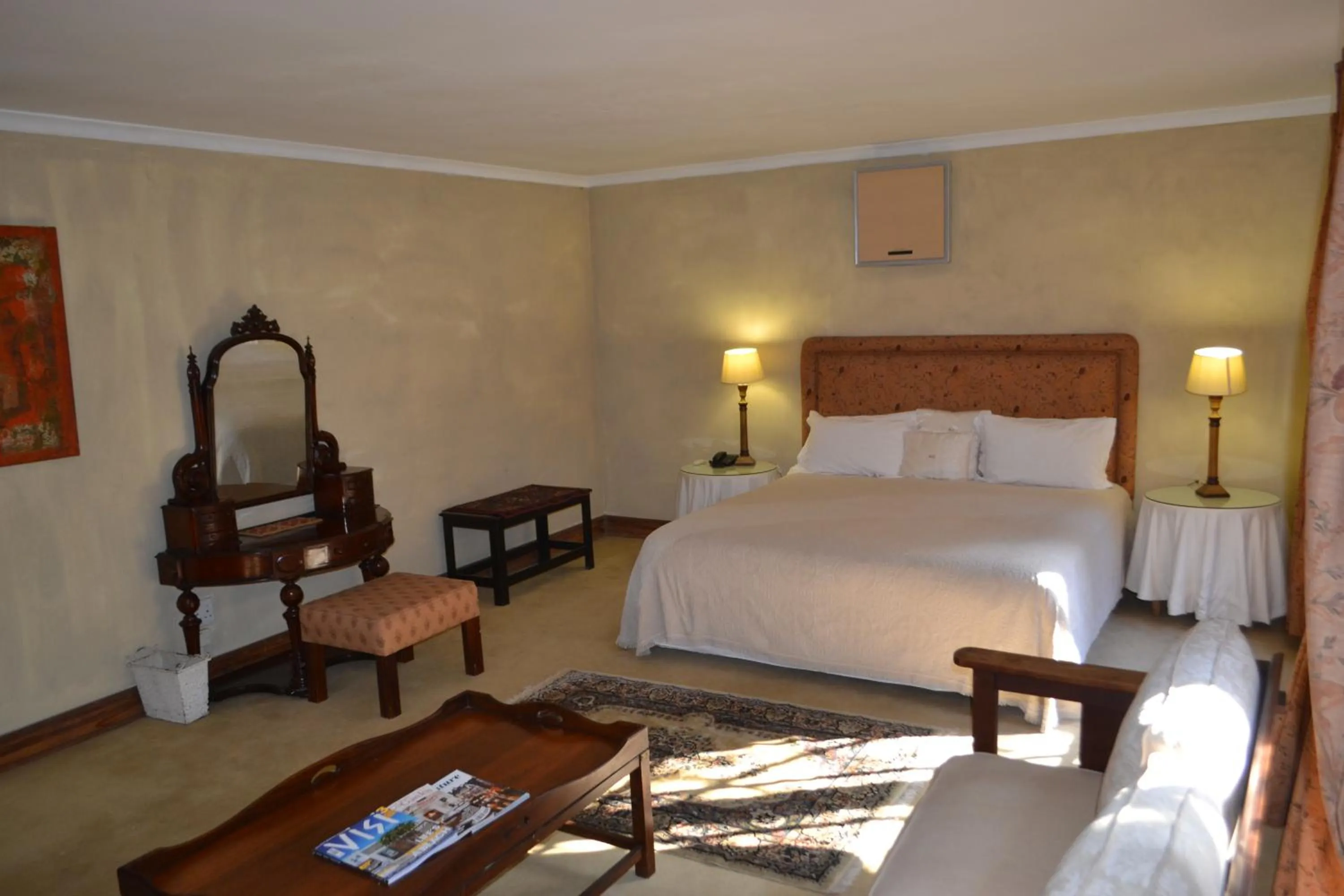 Seating area, Bed in Foxwood House Boutique Hotel