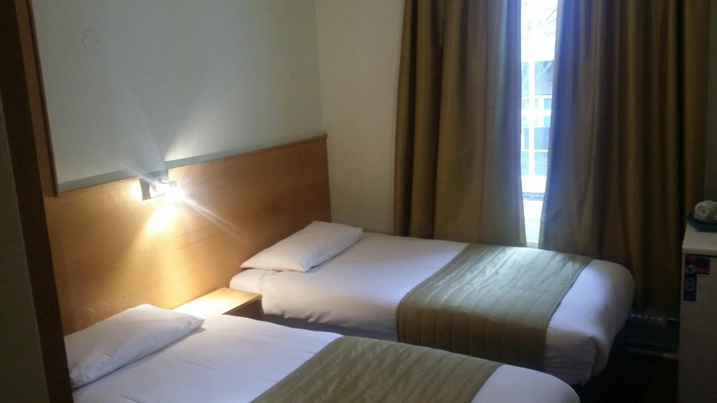 Bed in Arriva Hotel