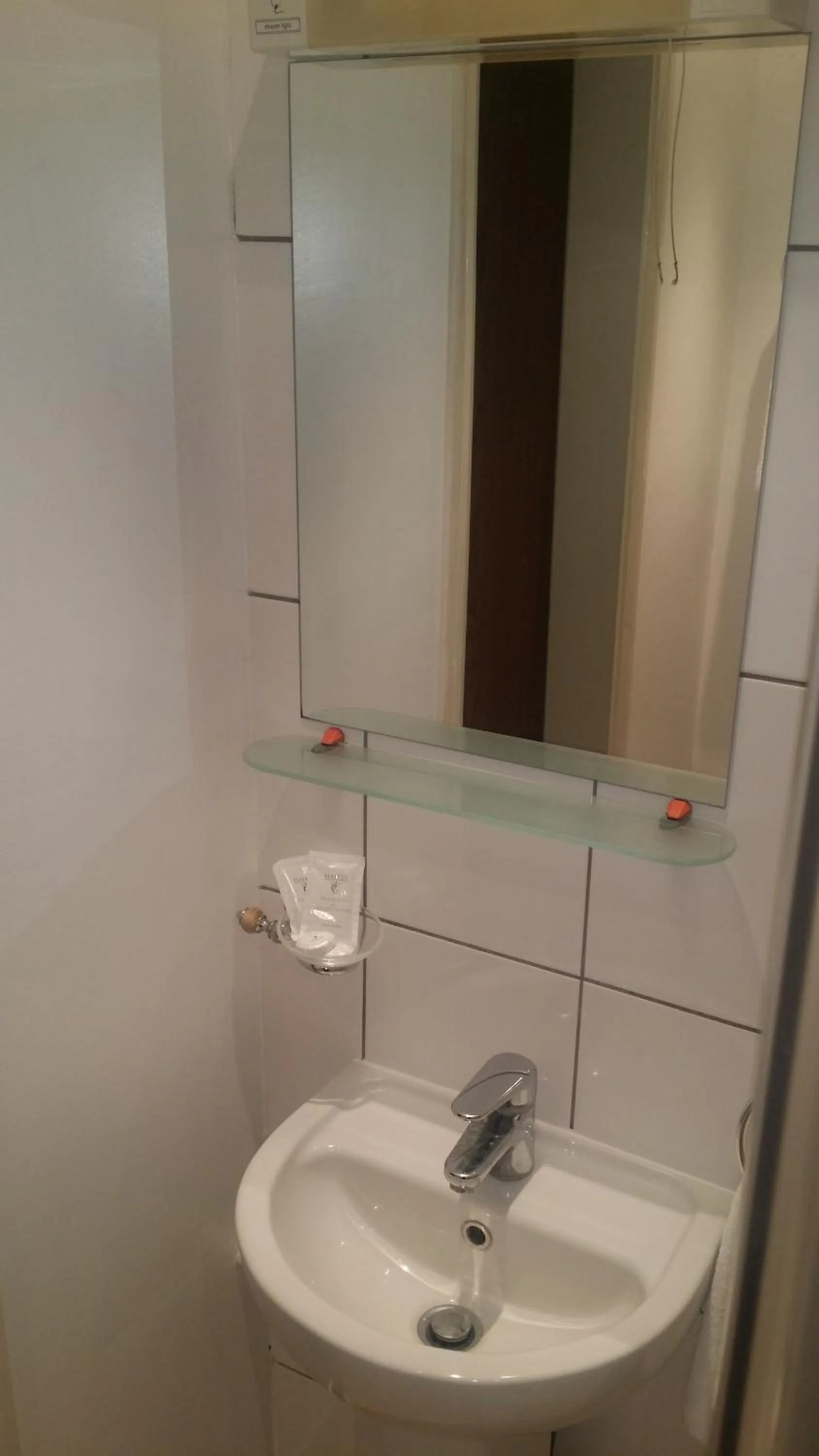 Bathroom in Arriva Hotel