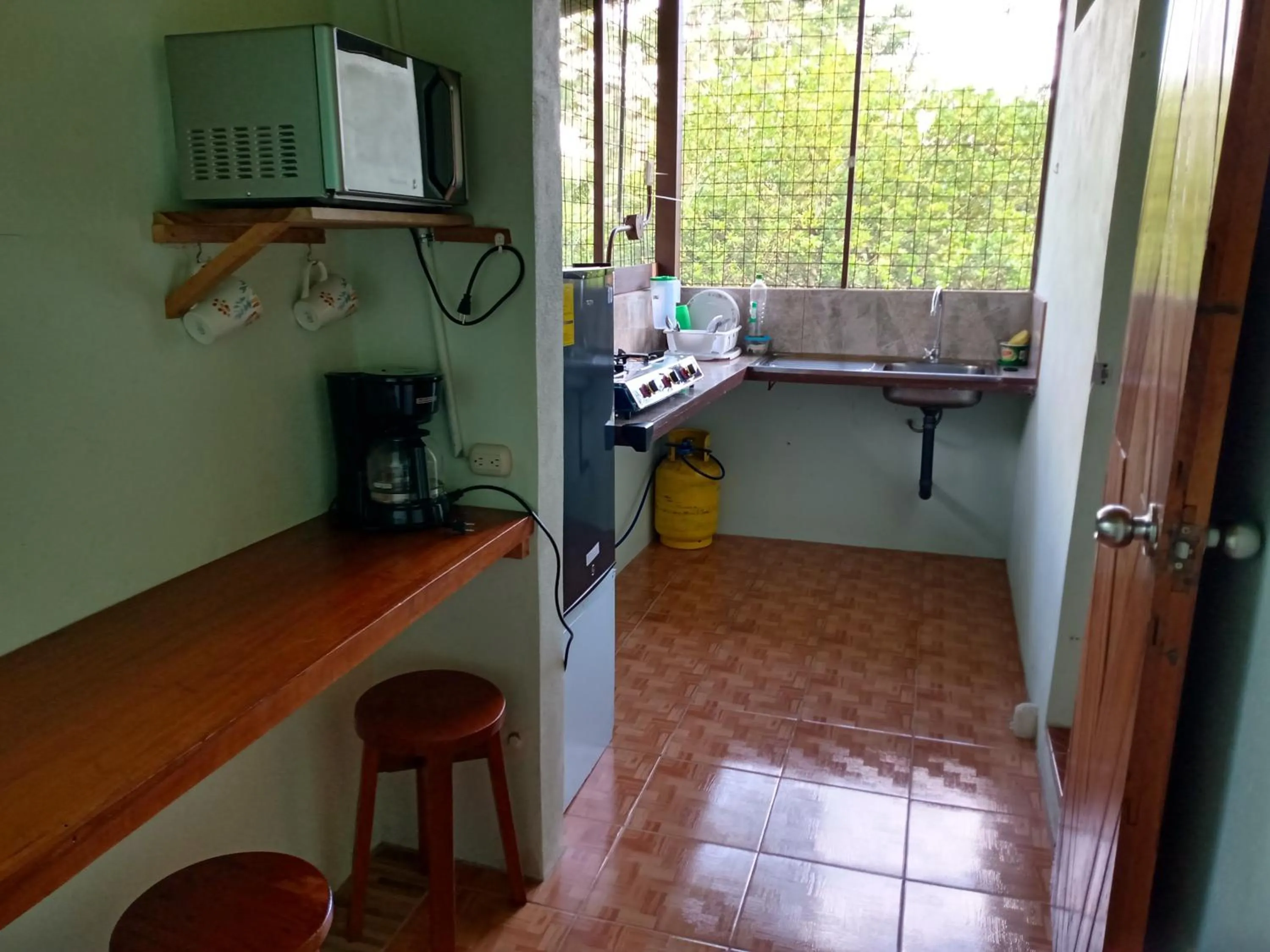 kitchen in Posada Rural Río Celeste