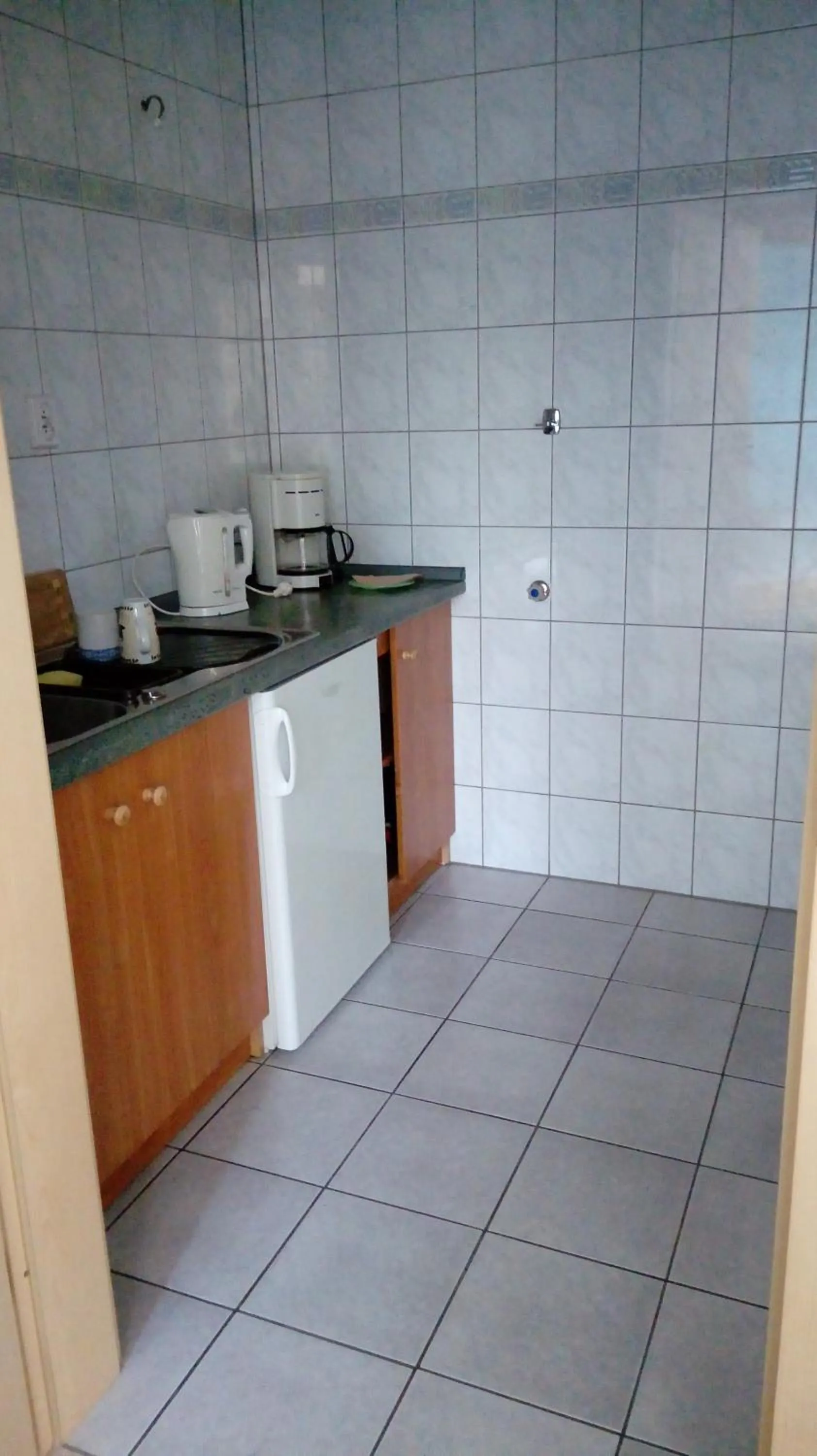 Kitchen or kitchenette in Gospodarstwo Agroturystyczne-Pensjonat SAD