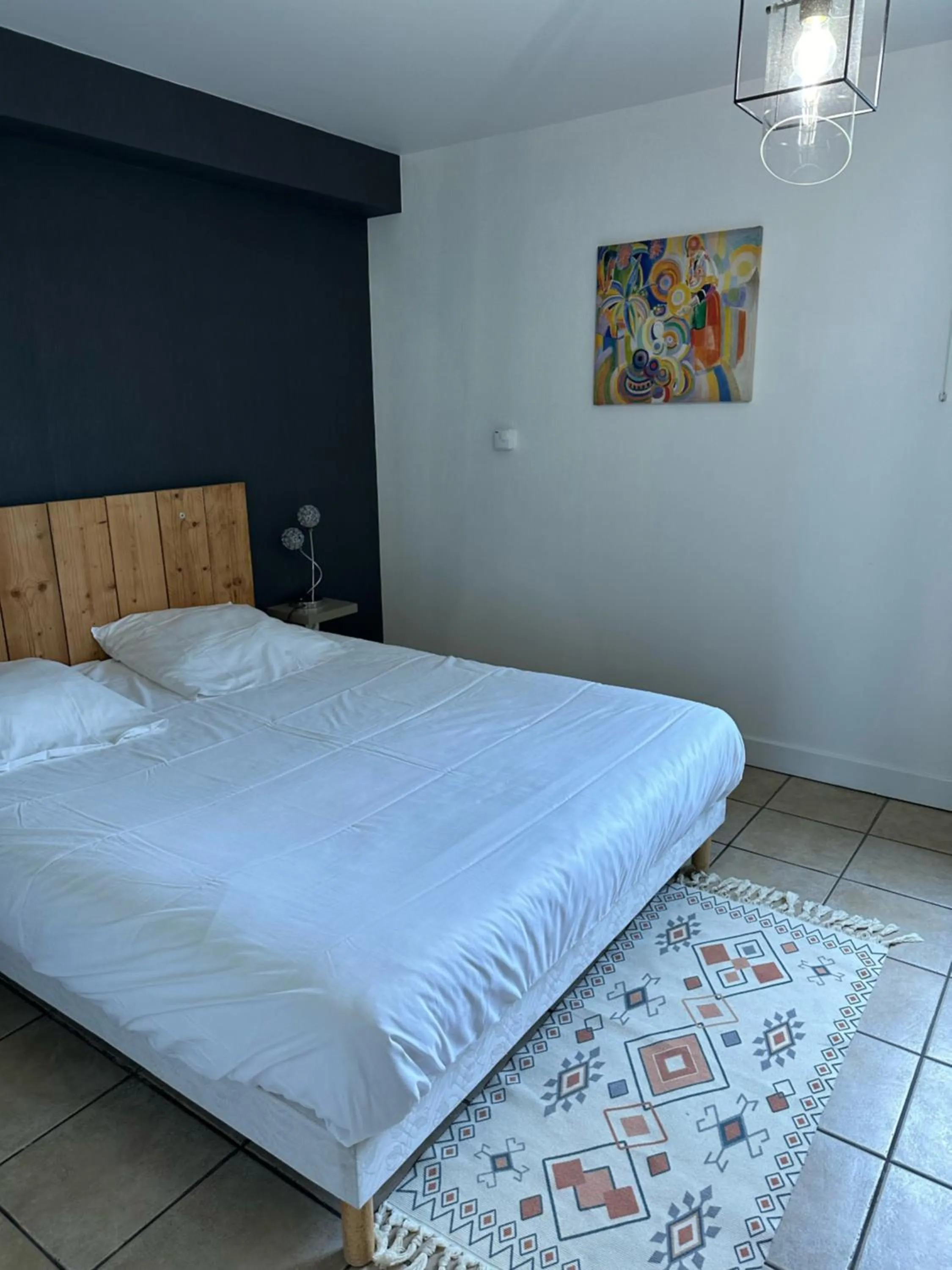 Bed in Logis Hôtel Volcan Sancy