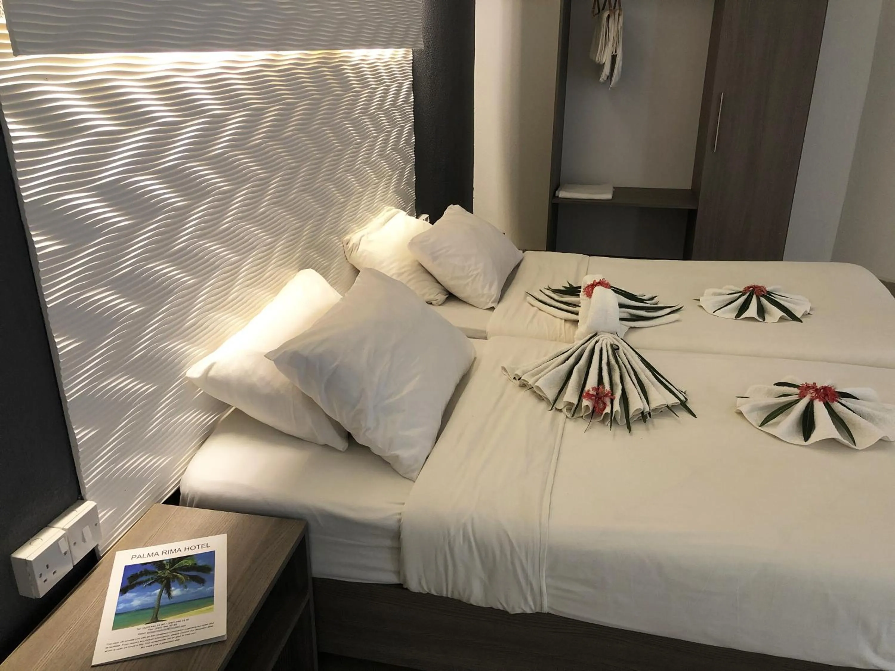 Bed in Palma Rima Hotel