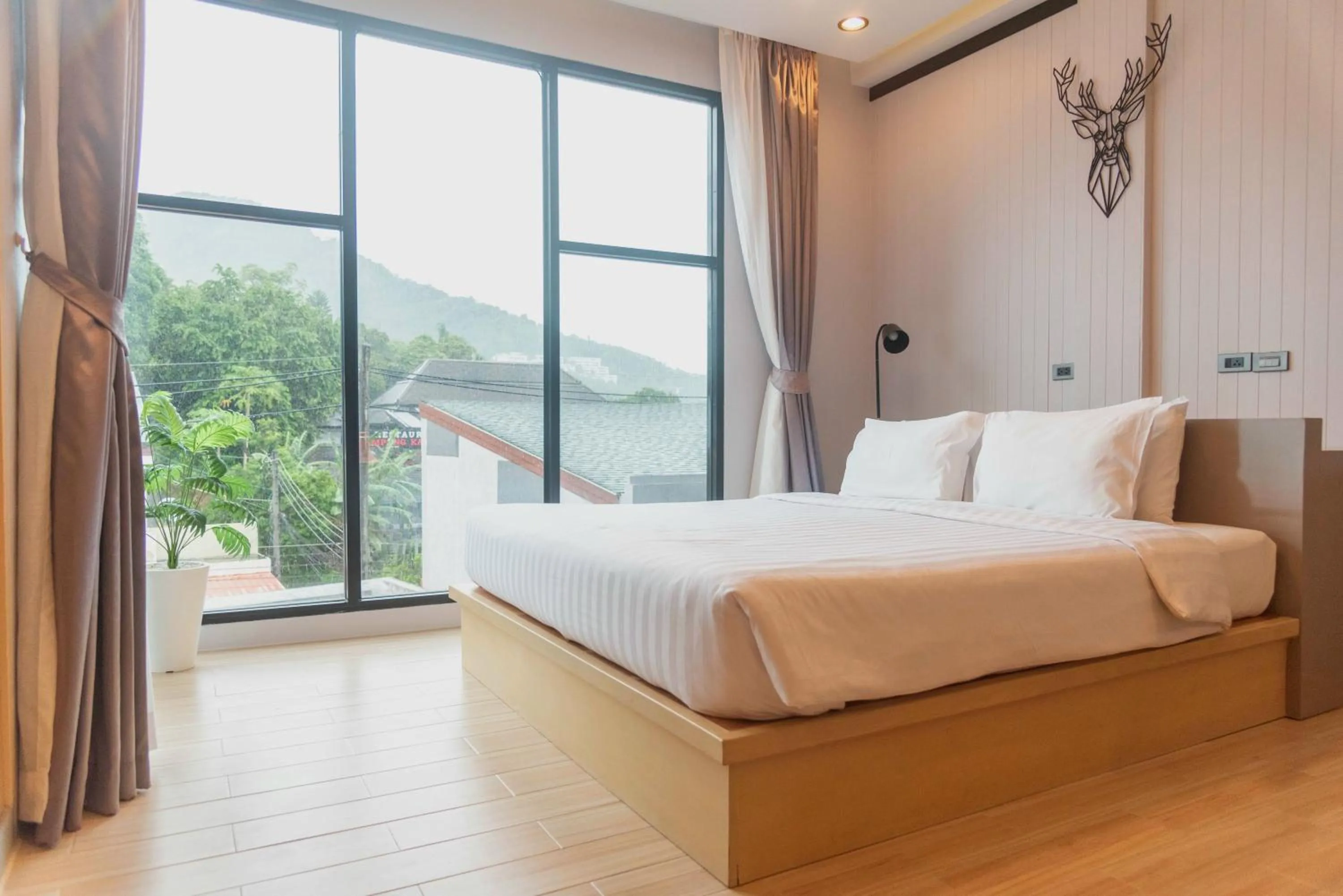 Bed in OneLoft Hotel