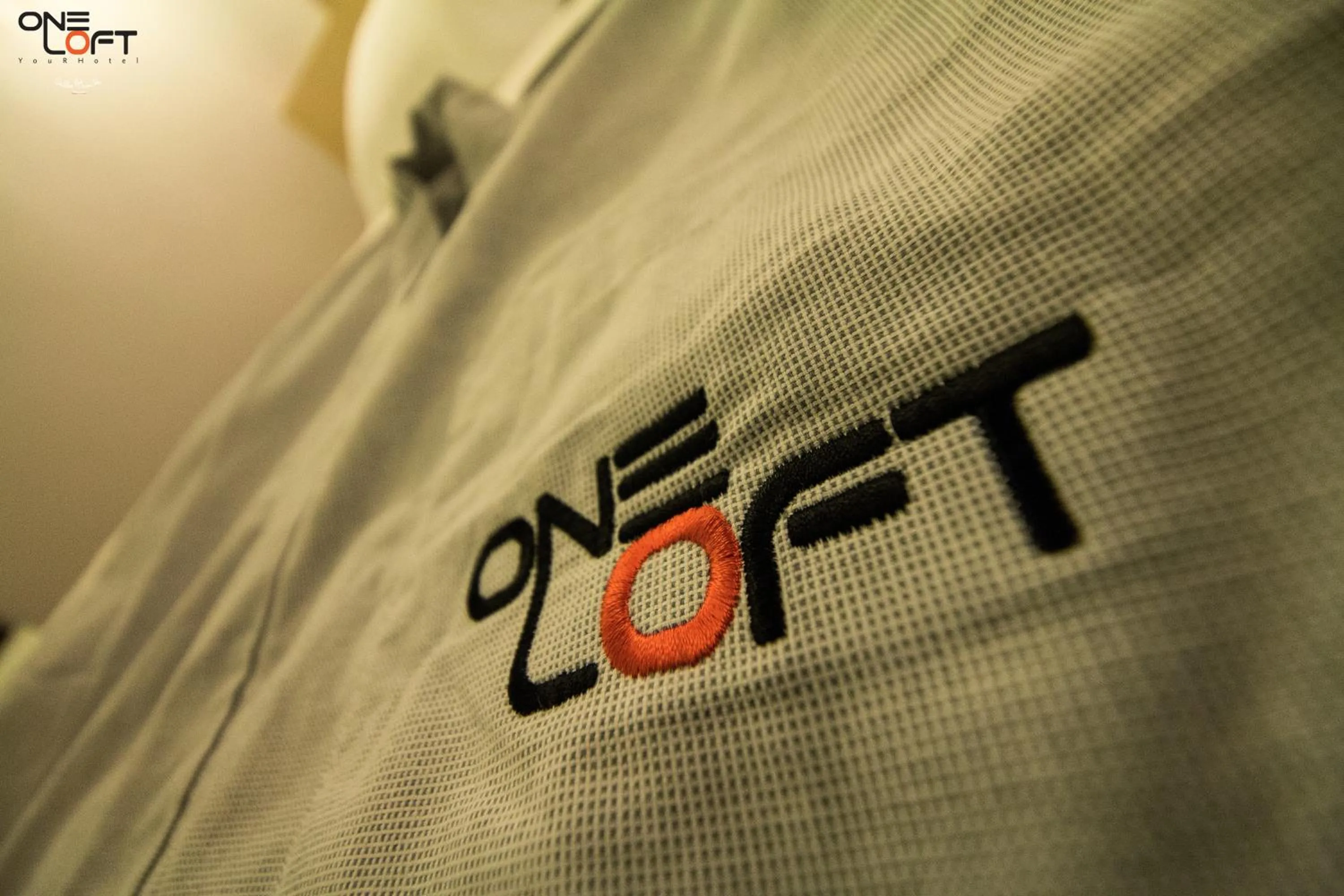 Property logo or sign, Bed in OneLoft Hotel