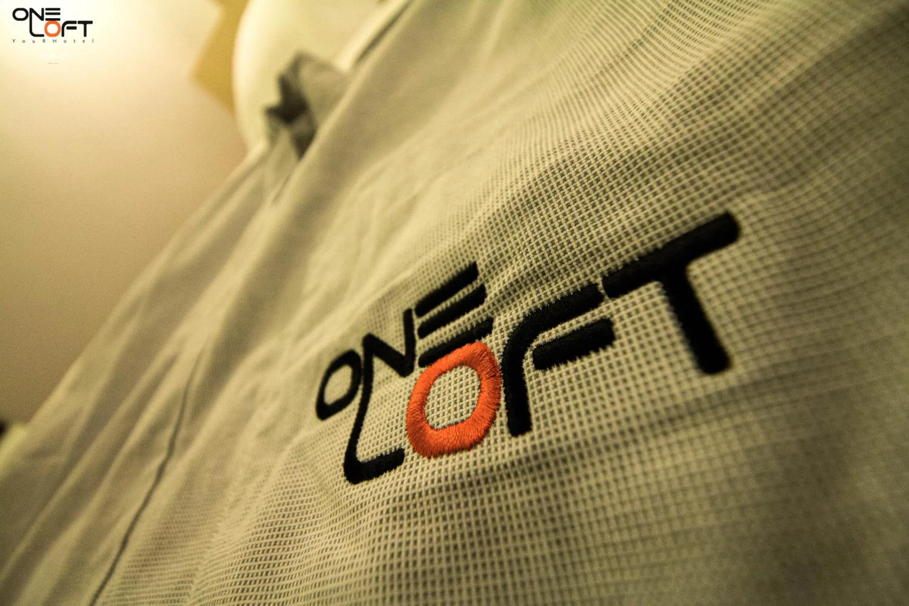 Property logo or sign, Bed in OneLoft Hotel