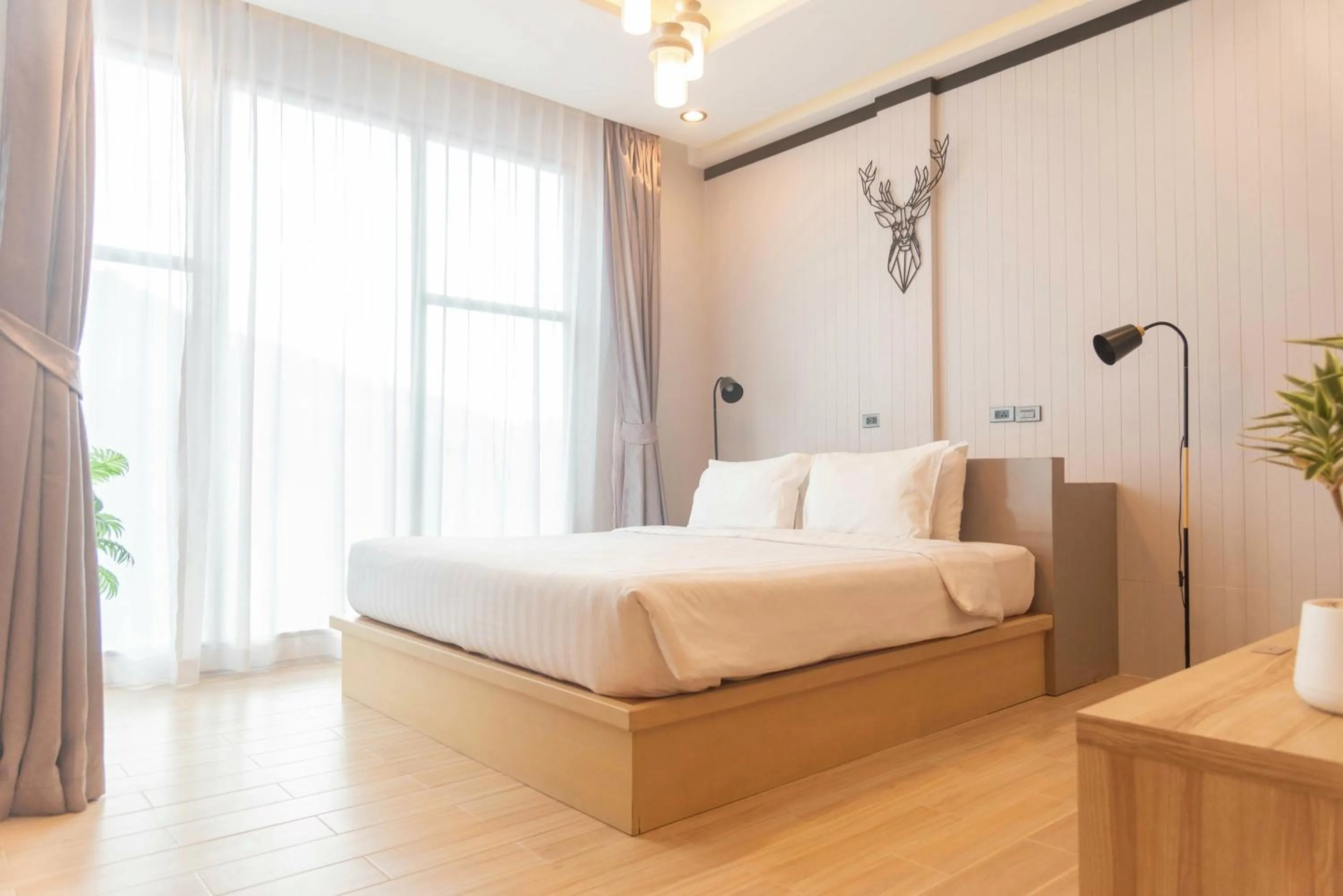 Bed in OneLoft Hotel